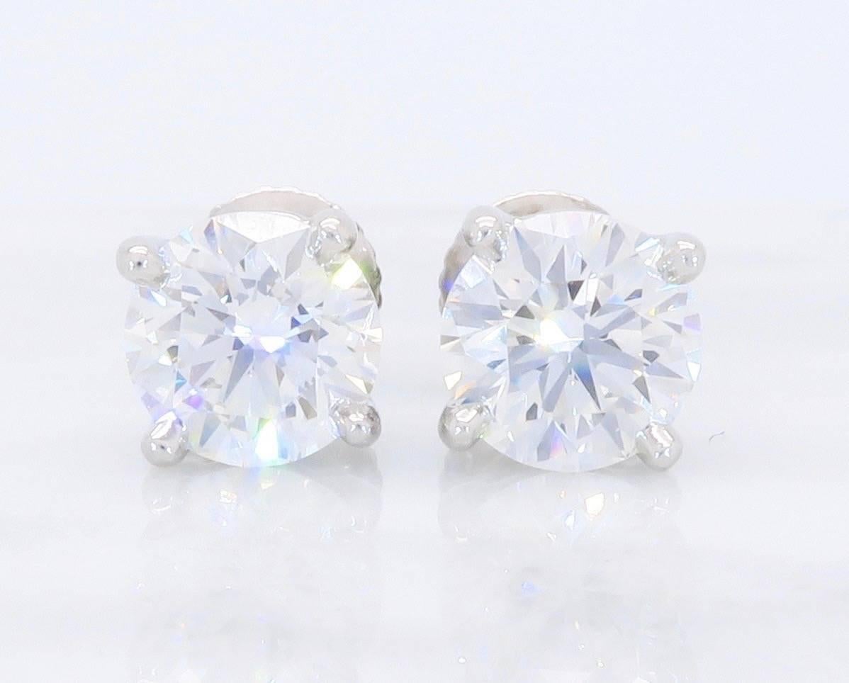 These Platinum Tiffany & Co. Diamond stud earrings are absolutely stunning. Each Platinum stud houses approximately a 1.01CT Round Brilliant Cut Diamond. The Diamonds have I color and are a clear VS1 Clarity. This stunning pair of earrings has