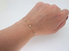 Diamond Station Bracelet crafted in 14k Yellow Gold