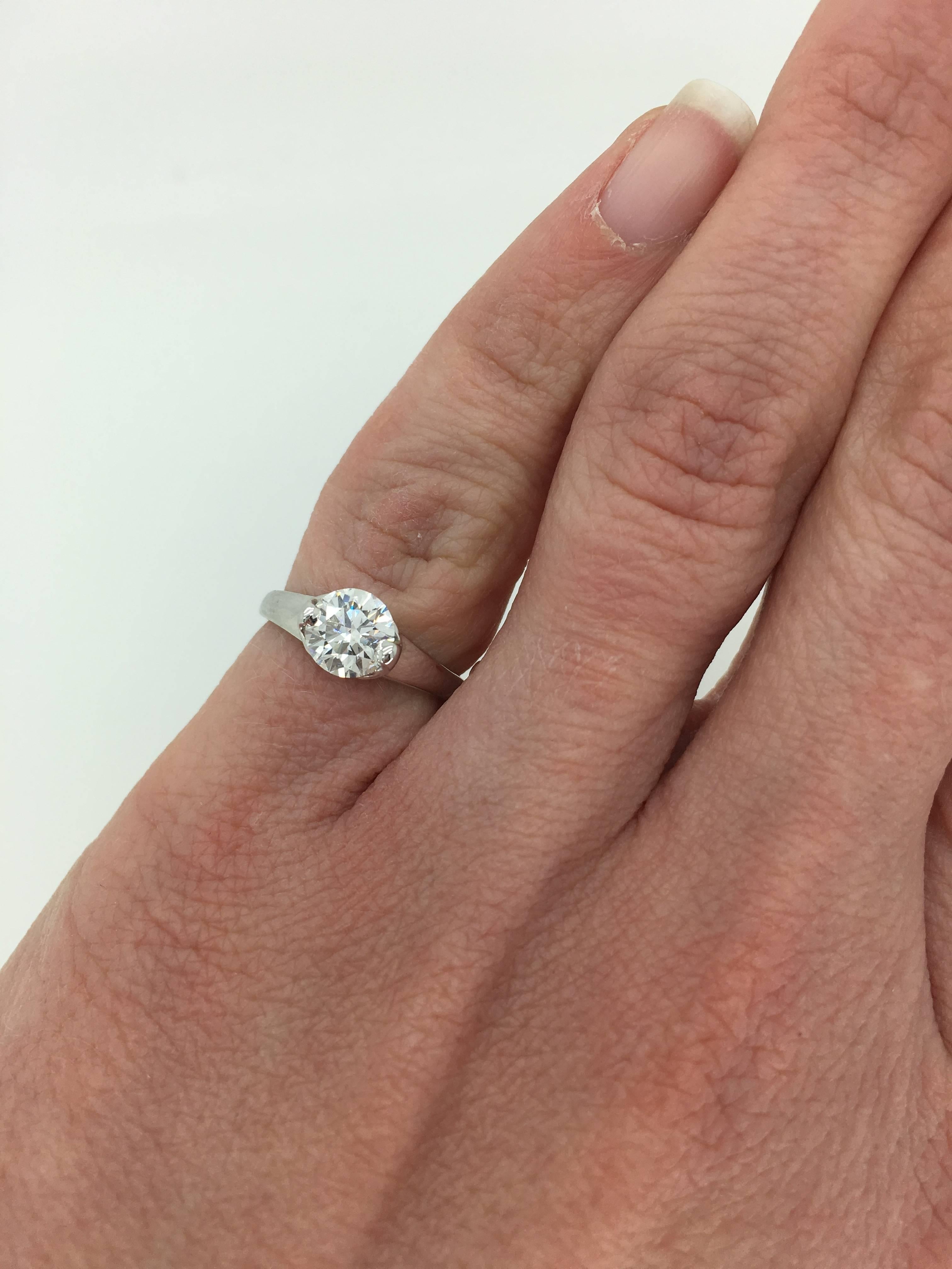 Unique Platinum solitaire engagement ring featuring a GIA Certified .78CT Round Brilliant Cut Diamond with F color and SI1 clarity. The ring is currently a size 3.5 and weighs 15.3 grams.