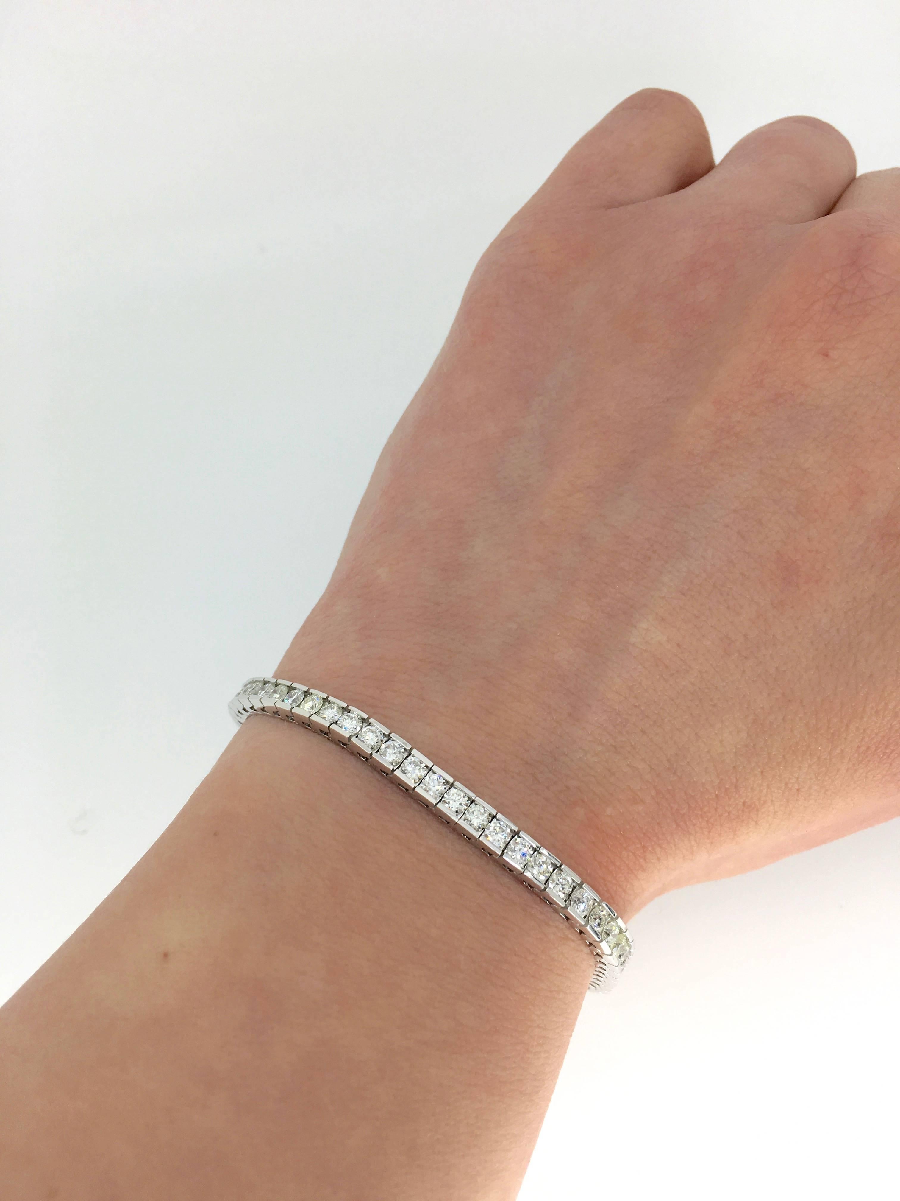 Beautiful bar set tennis bracelet features approximately 4.03CTW of Round Brilliant Cut Diamonds made up of 63 diamonds. The featured diamonds display an average color of G-J and an average clarity of SI. The bracelet is 7” long and weighs 14.4