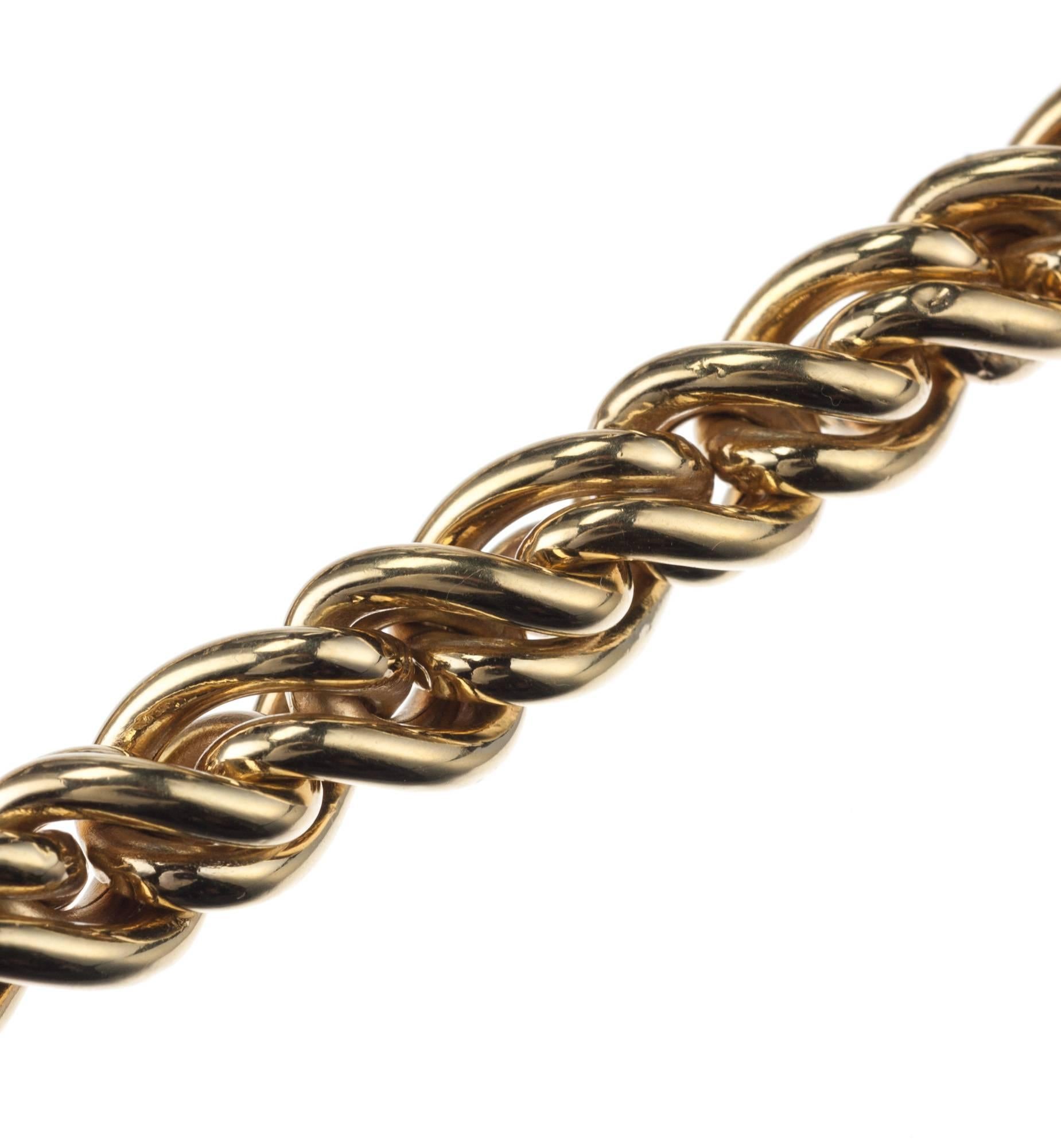 An intricate 18-karat yellow gold twisted wheat link chain of remarkable craftsmanship. The chain’s links are constructed from yellow gold tubing making it lightweight and comfortable to wear. Measures 16” long and approx. 0.25” wide. 