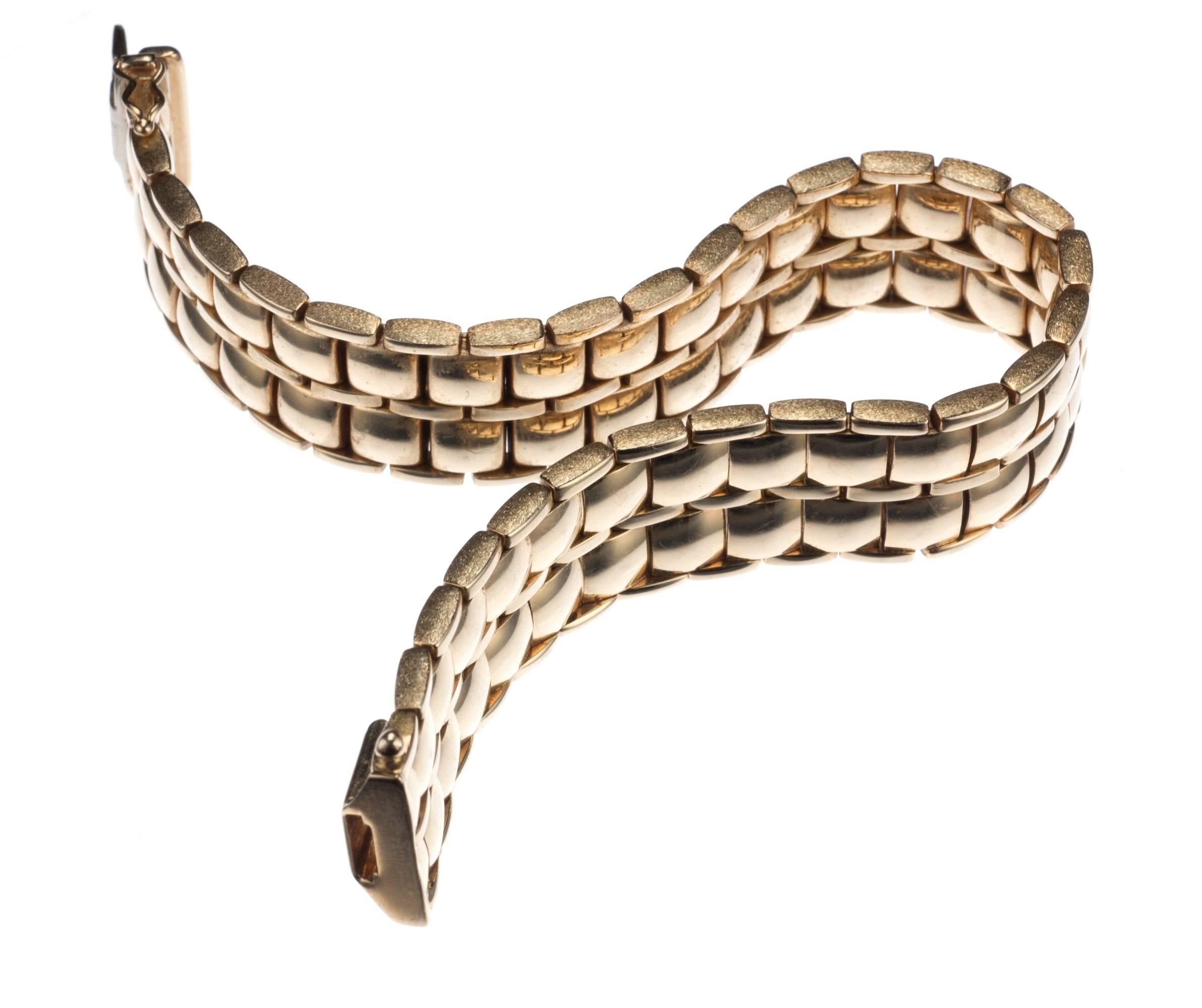 At home in any jewelry collection, a classic tile-link bracelet in 14-karat yellow gold. The outermost edge of the bracelet has a matte-finish, a subtle accent that fits naturally with such a demure bracelet. Clasp includes figure-8 safety. Bracelet