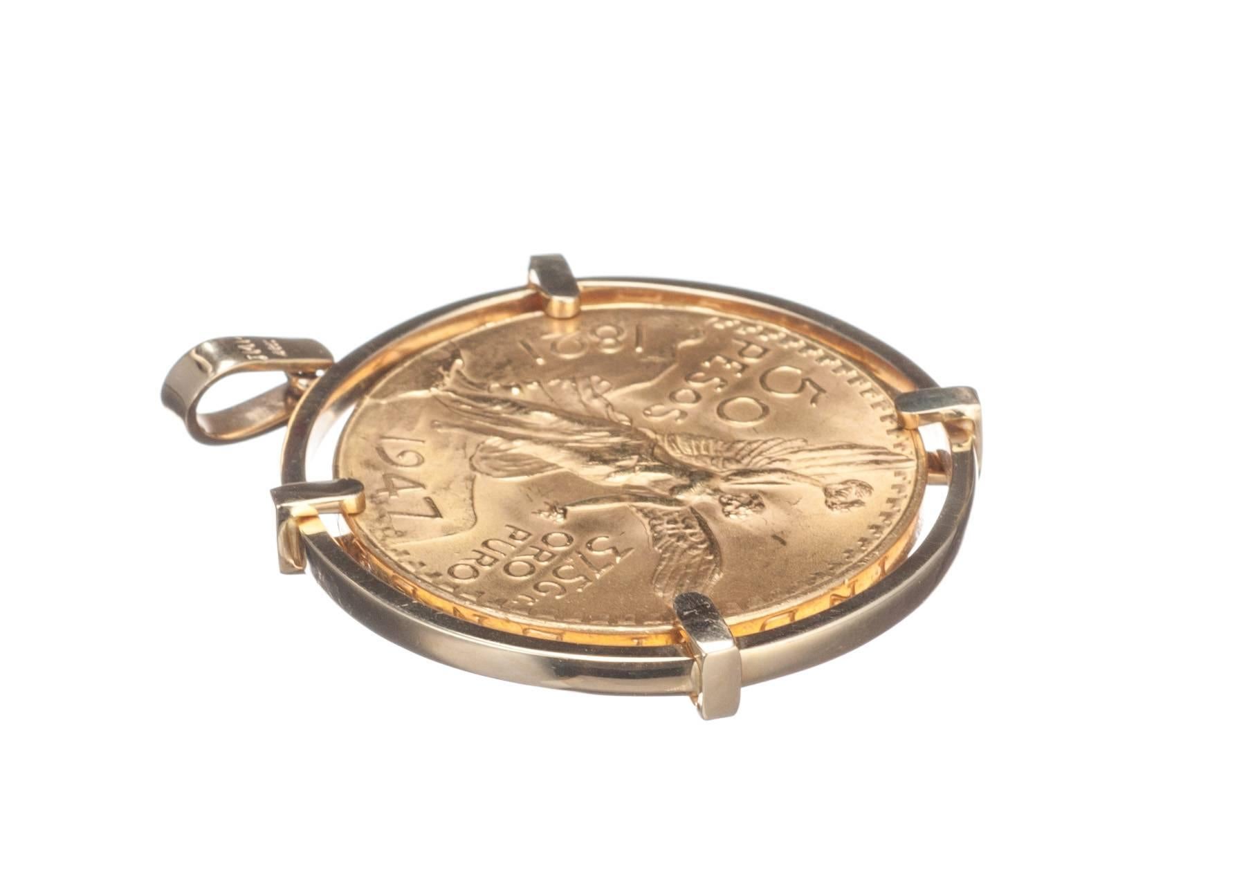 A 22-karat yellow gold Mexican 50 Peso coin set in a 14-karat yellow gold pendant frame. Including the frame, the pendant measures approx 1.75” in diameter.