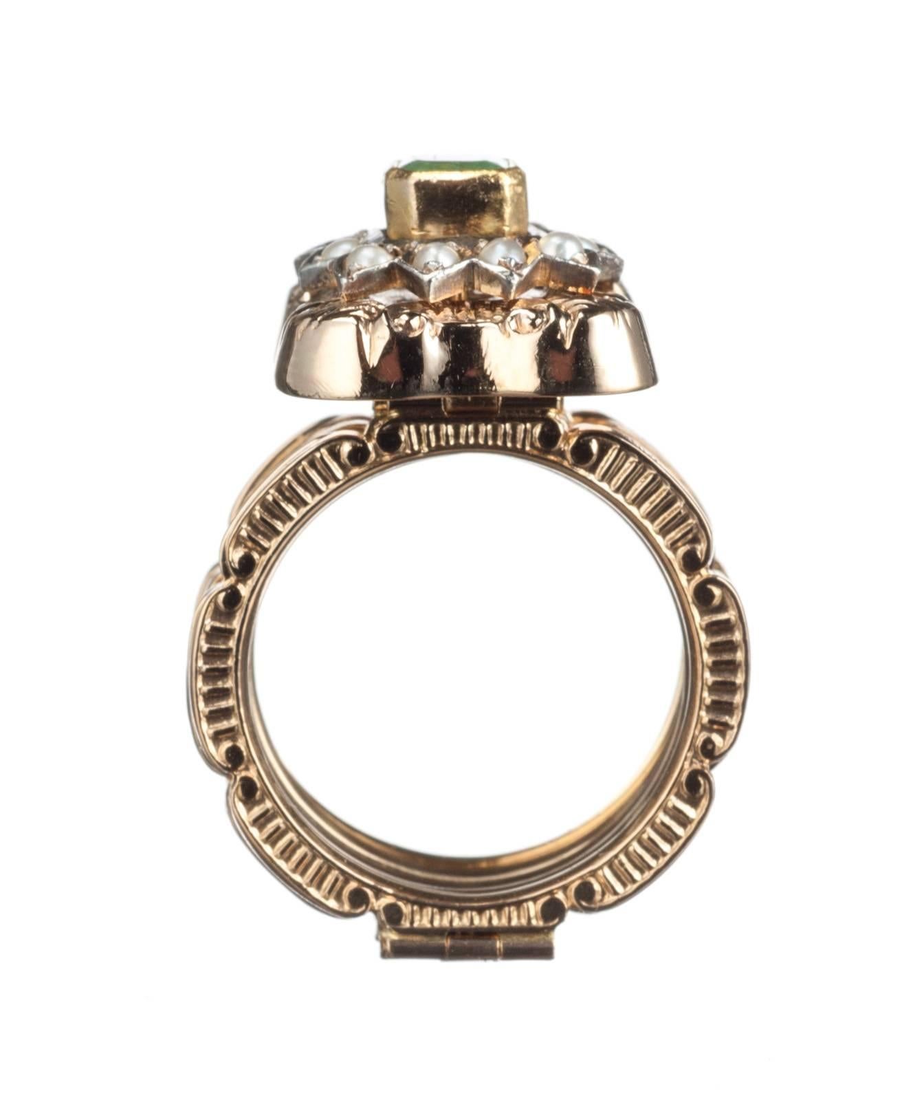 This ring has a secret: it is a bracelet too! Incredible craftsmanship in 18-karat yellow gold composes a series of eight articulated links that unfold to reveal a bracelet. Set with an emerald, approx. .65ct., and 12 freshwater cultured half