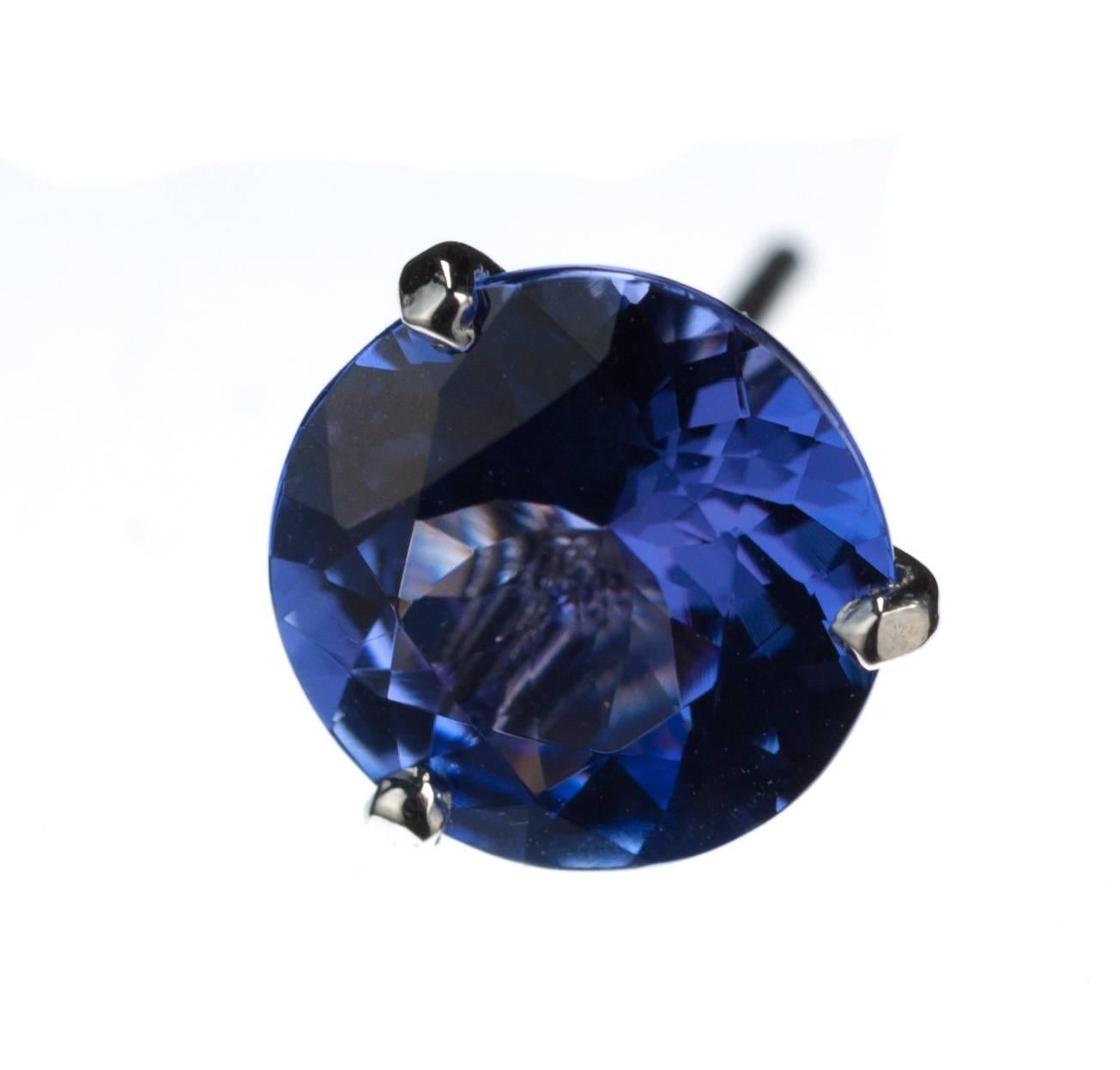 With all the rich and vibrant blue-violet hues that make Tanzanite so desirable, a pair of beautiful round Tanzanite stud earrings, 4.01ctw., is set in three-prong platinum mountings.
Created by Elleard Heffern Fine Jewelers. Secured on posts with