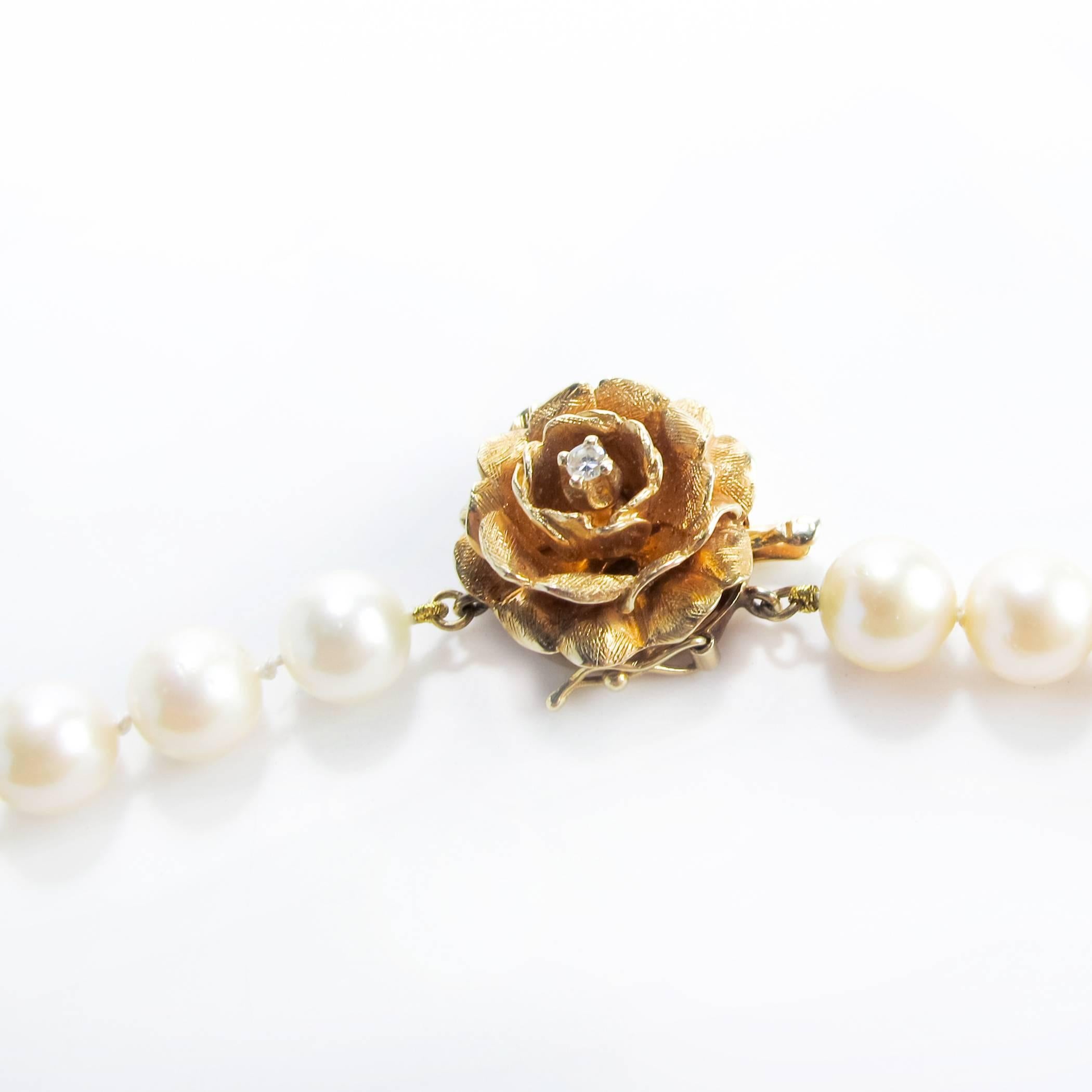 Opera Length Pearls with Gold and Diamond Flower Clasp For Sale 1