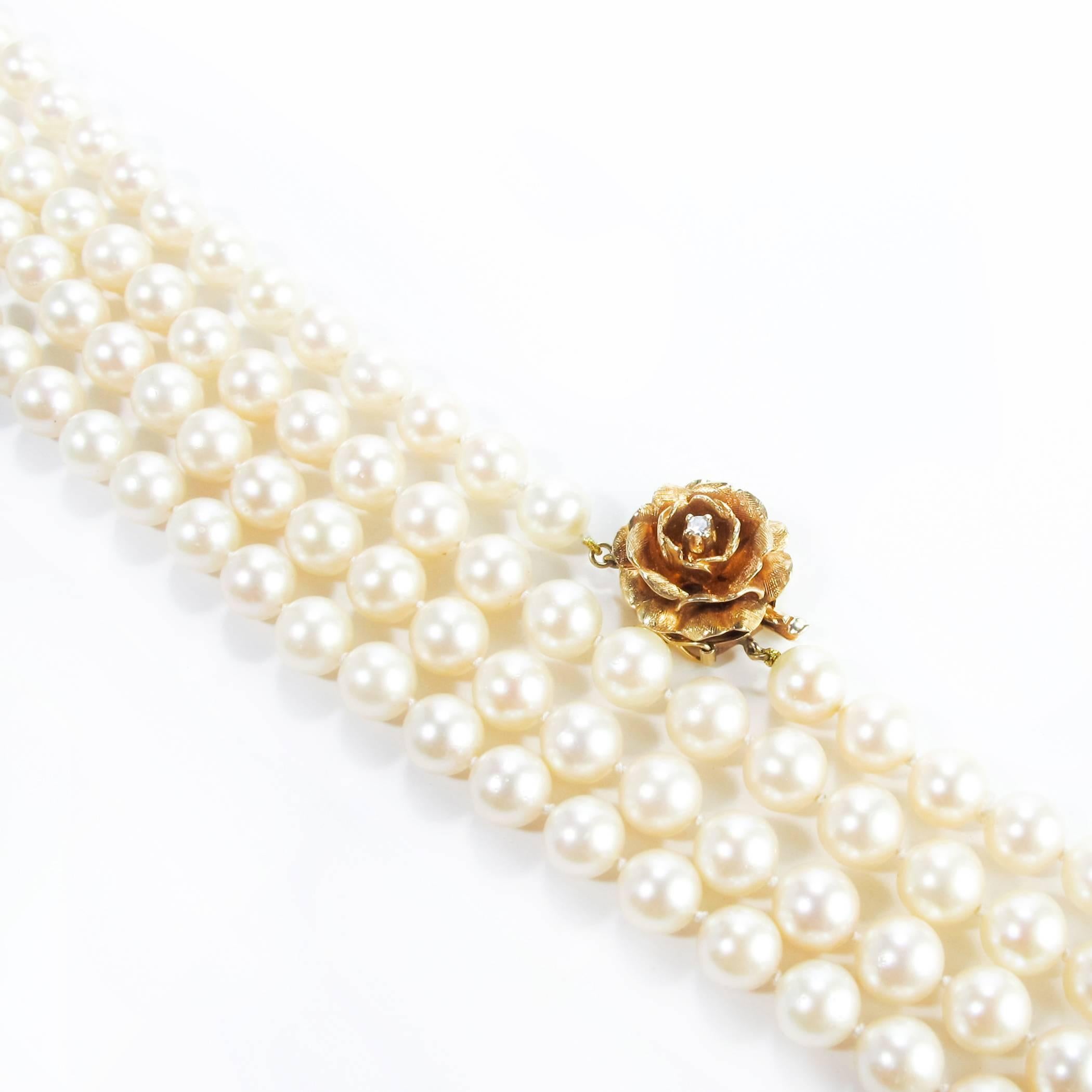 Women's Opera Length Pearls with Gold and Diamond Flower Clasp For Sale