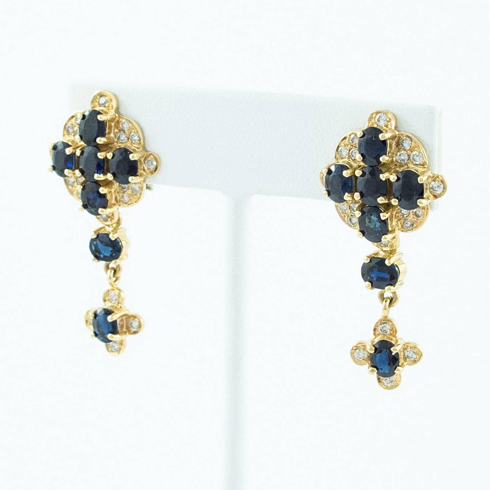 Modern Blue Sapphire Diamond Gold Cross Drop Earrings For Sale
