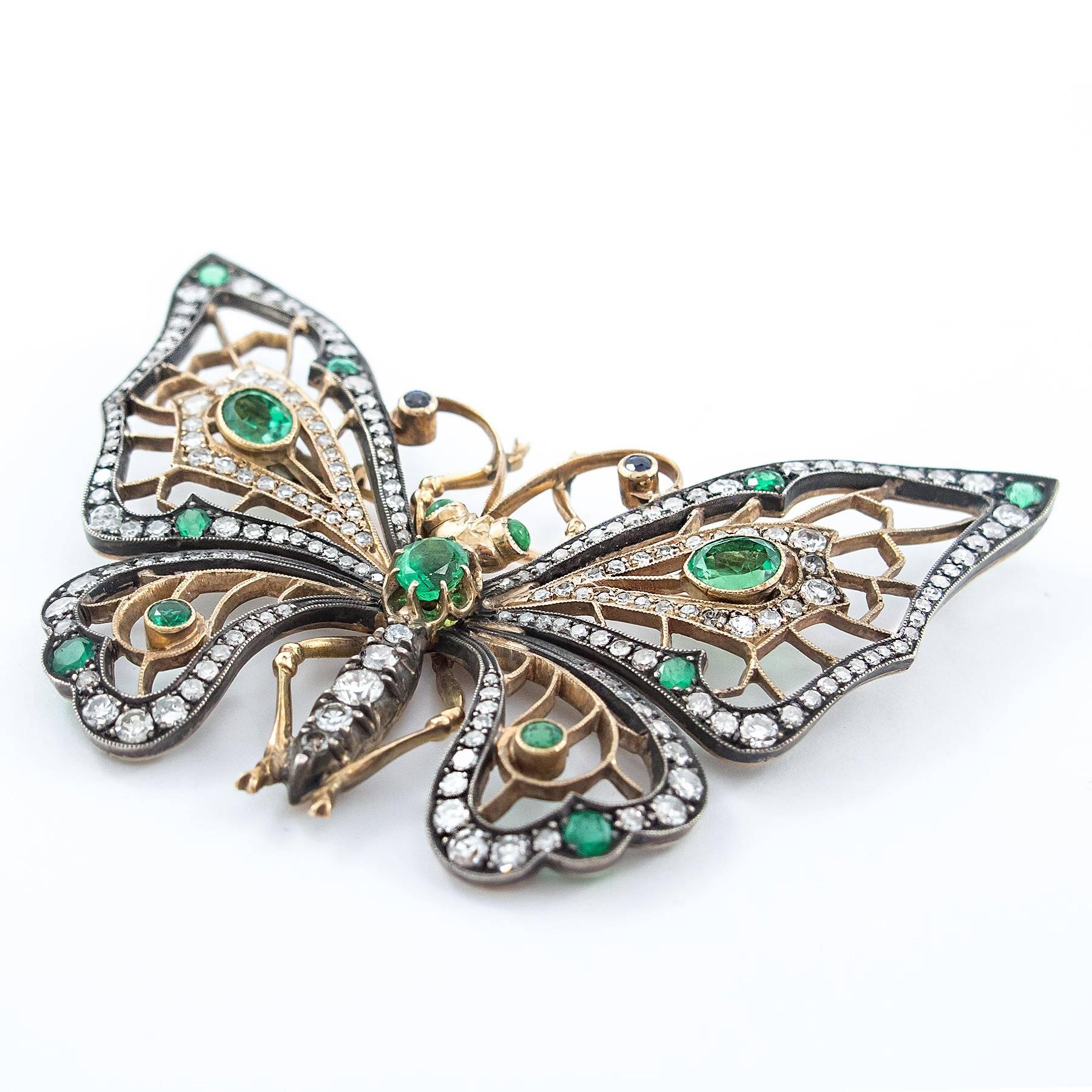 Women's Splendid Emerald Diamond Butterfly Brooch For Sale