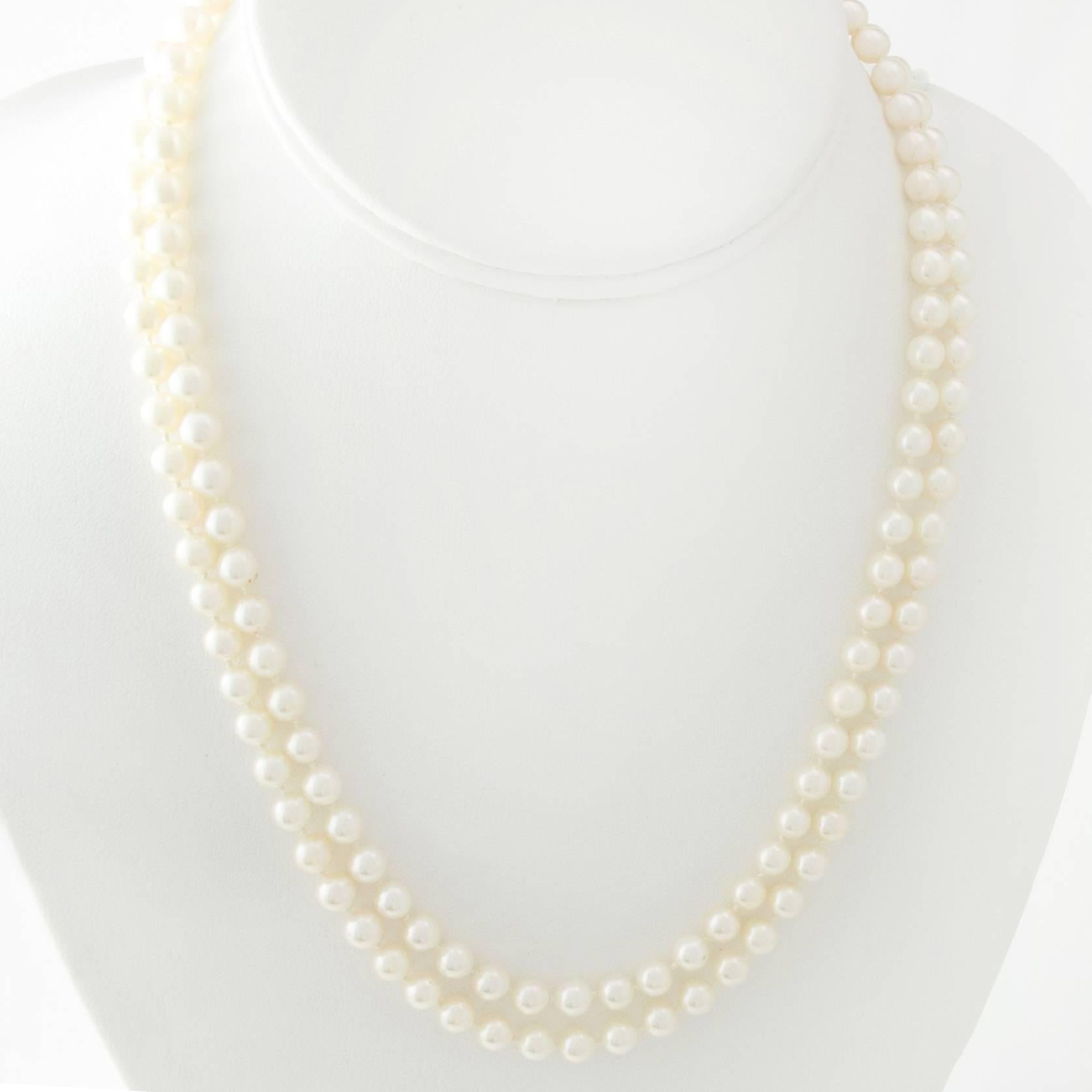 A classic Japanese, Saltwater Akoya Pearl Necklace can be worn as a single strand - or you can wear it doubled using the 14K yellow gold navette clasp to close it. 

The pearls are Silver Cream in color with slight Rose, Green and Aubergine
