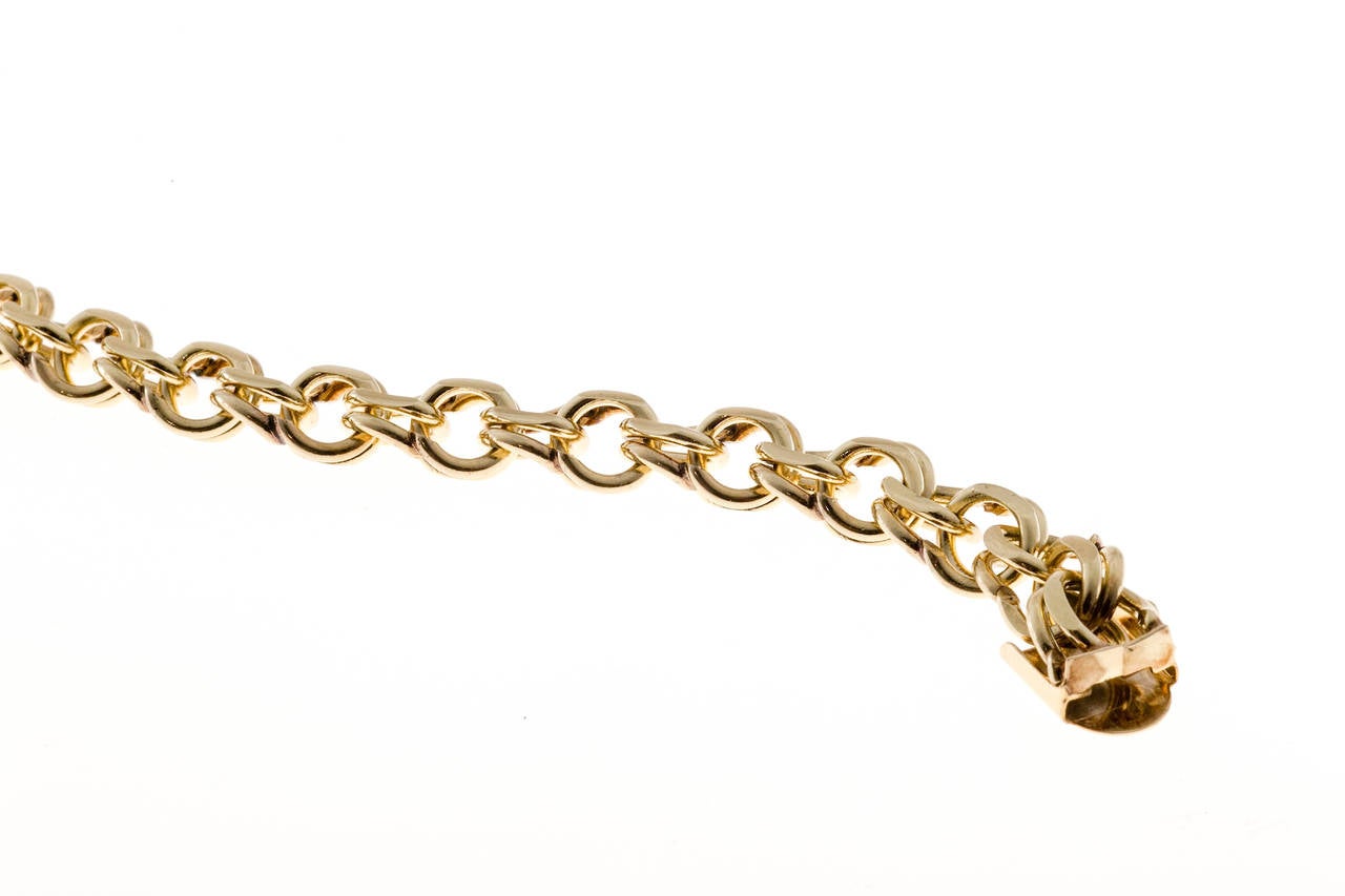 Classic heavy solid 14k yellow gold double spiral link bracelet. Suitable for charms or to wear by itself.  Hidden box catch with side locking safety.

14k Yellow Gold
Stamped: 14kt
29.7 Grams
7 1/8 X 3/8 inches
9.5mm wide