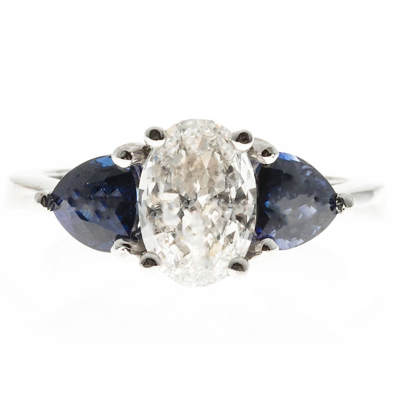 Oval Diamond and Trillion Cut Ceylon Sapphire Platinum Ring