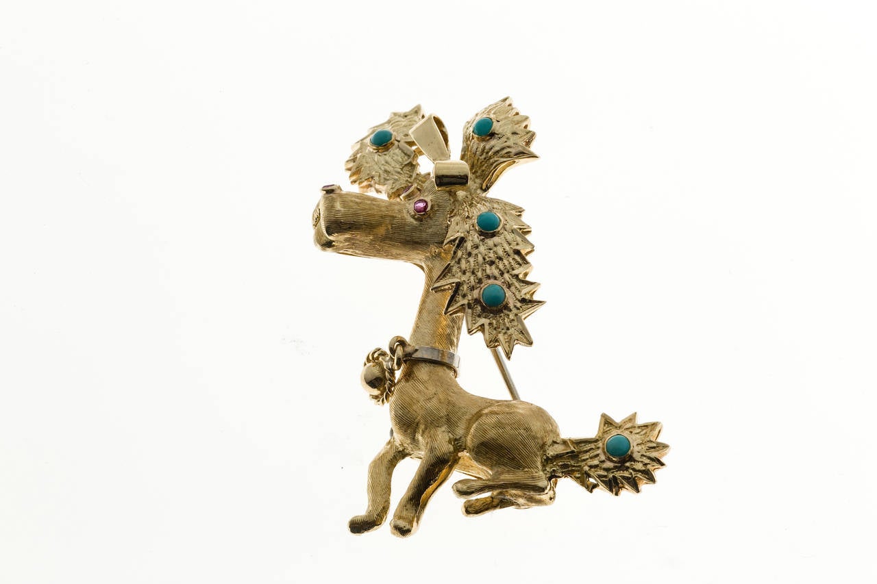 Wonderful top quality  party dog pin. Circa 1950.

5 Natural Persian Turquoise 2mm bright blue
2 2mm bright red ruby eyes
18k Yellow Gold
16.5 grams
Tested and Stamped: 18k
Hallmark: S+F
Top to bottom: 49.39mm or 1.94 inches
Width: 39.32mm