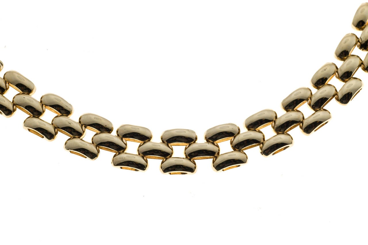 17.5 inch three row panther link necklace from the maker of RC.

14k yellow gold
25.9 grams
Stamped: 14k
Hallmark: RC
Total length: 17.5 inch
Width: 9.28mm
Thickness/Depth: 2.54