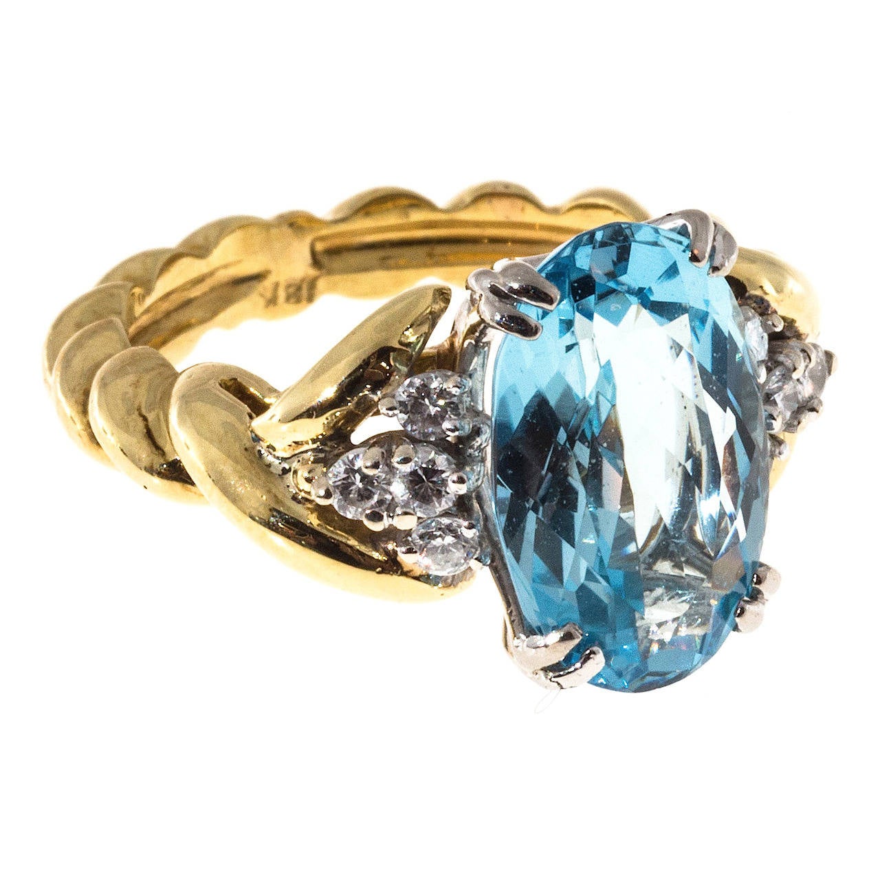 Natural untreated oval Aqua and diamond engagement ring. Handmade solid twisted 18k yellow goldsetting. Bright sparkly diamonds. 

1 oval genuine fine bright medium gem blue Aqua, approx. total weight 4.11cts, VS, 13.8 x 8.7 x 5.4mm
8 full cut