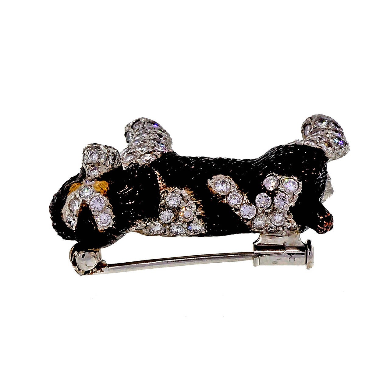 Maker E. Wolfe,  Brittany or Springer Spaniel 18k white gold dog brooch. Extra fine workmanship and material. E. Wolfe started in 1850 and have been jewelers to the crown heads of Europe. They are most famous for Tiara’s and animals. 

93 round