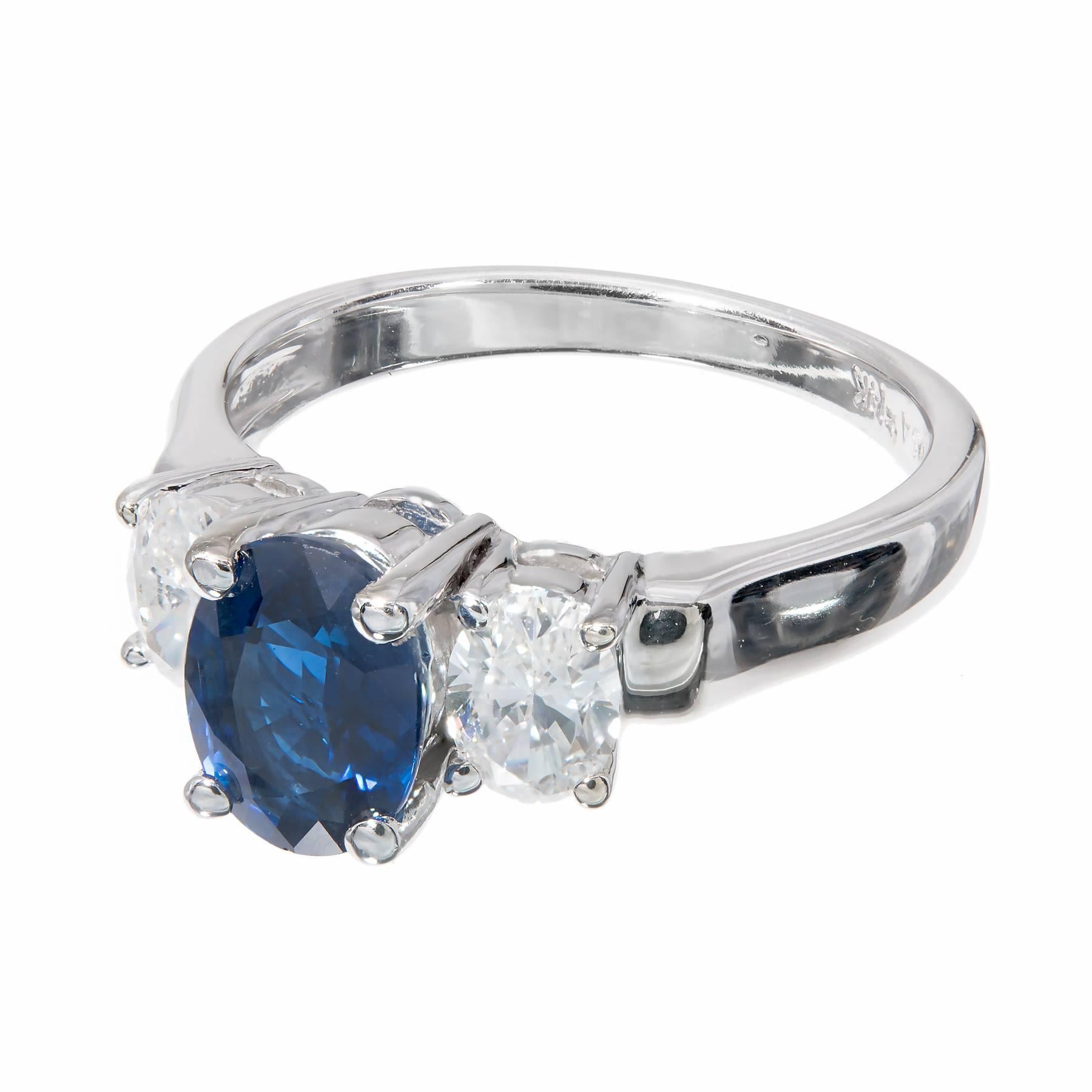 White gold bright Royal blue Sapphire engagement ring. The center Sapphire is GIA certified simple heat only. Matched with bright white diamonds.

1 oval Royal blue Sapphire, approx. total weight 1.45cts, simple heat only, GIA certificate