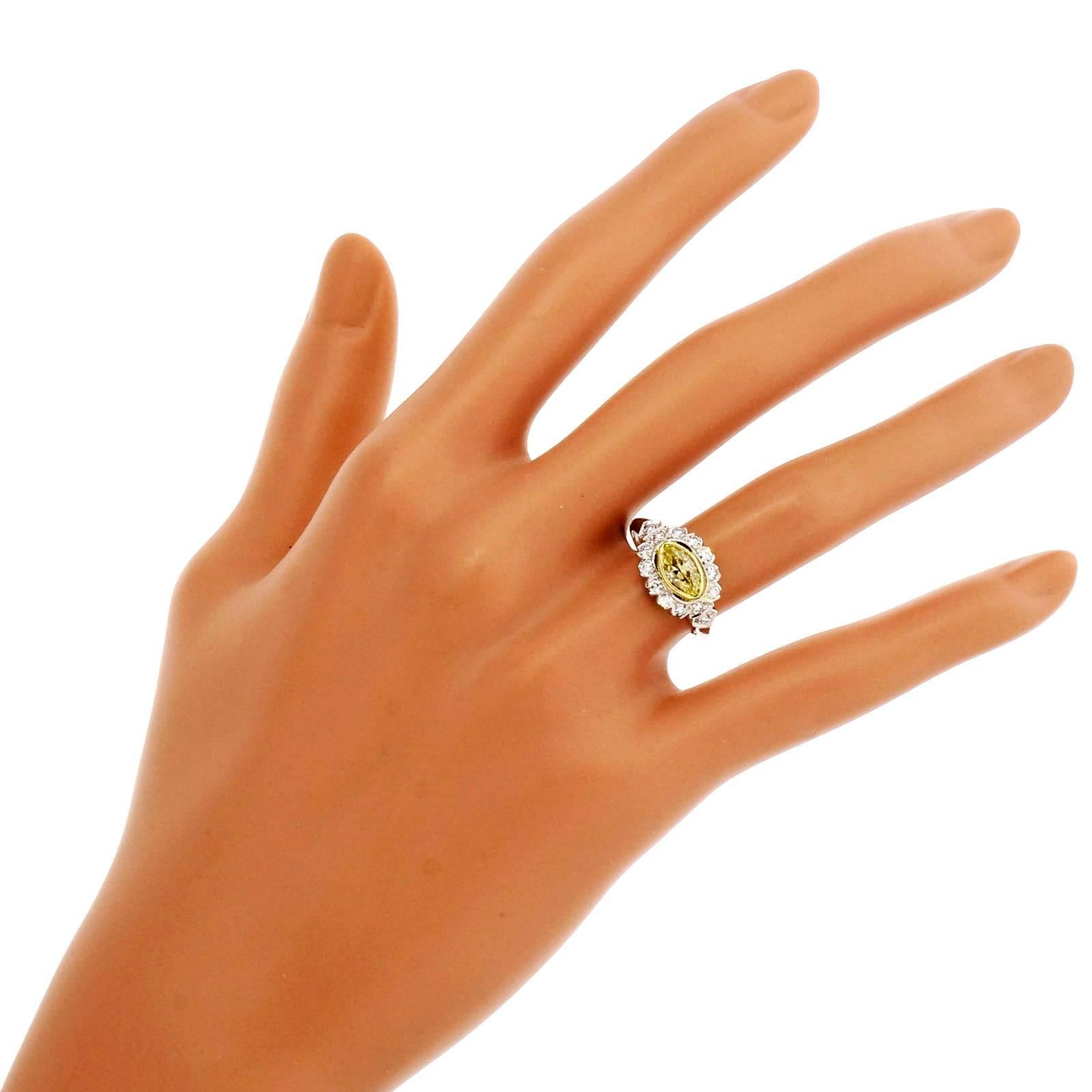 Marquise Cut .65 Carat Fancy Intense Yellow White Diamond Platinum Engagement Ring For Sale
