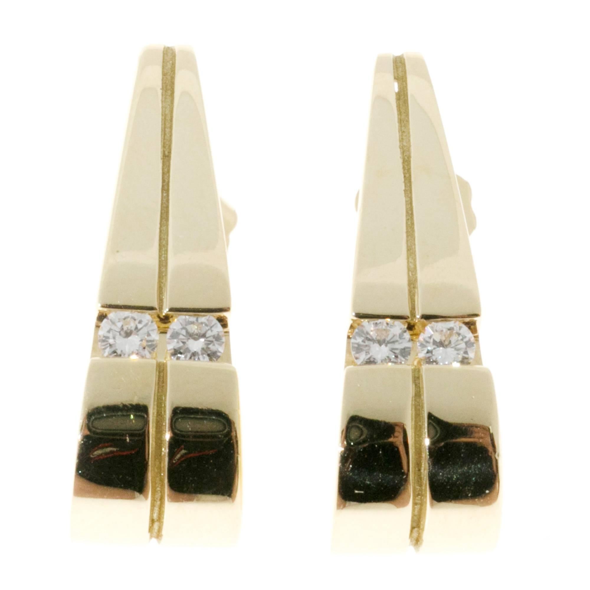 Beautiful John Atencio curved design 18k yellow gold earrings stamped JA with bright full cut diamonds.

4 round diamonds, approx. total weight .20cts, G, VS
18k yellow gold
Tested and stamped: 18k
Hallmark: JA
7.0 grams
Top to bottom: