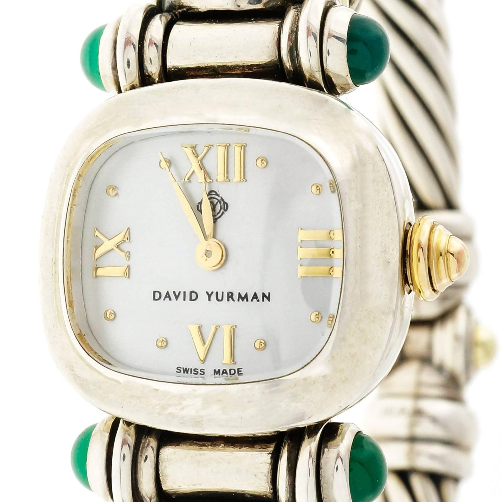 David Yurman  Amethyst green Tourmaline silver and 14k yellow gold cable wristwatch with fully serviced Quartz movement. Mother of pearl original dial. Fits a 7 inch wrist. 

2 square Amethyst 4.45 x 5mm
4 round cabochon green Tourmaline 3.6mm
1