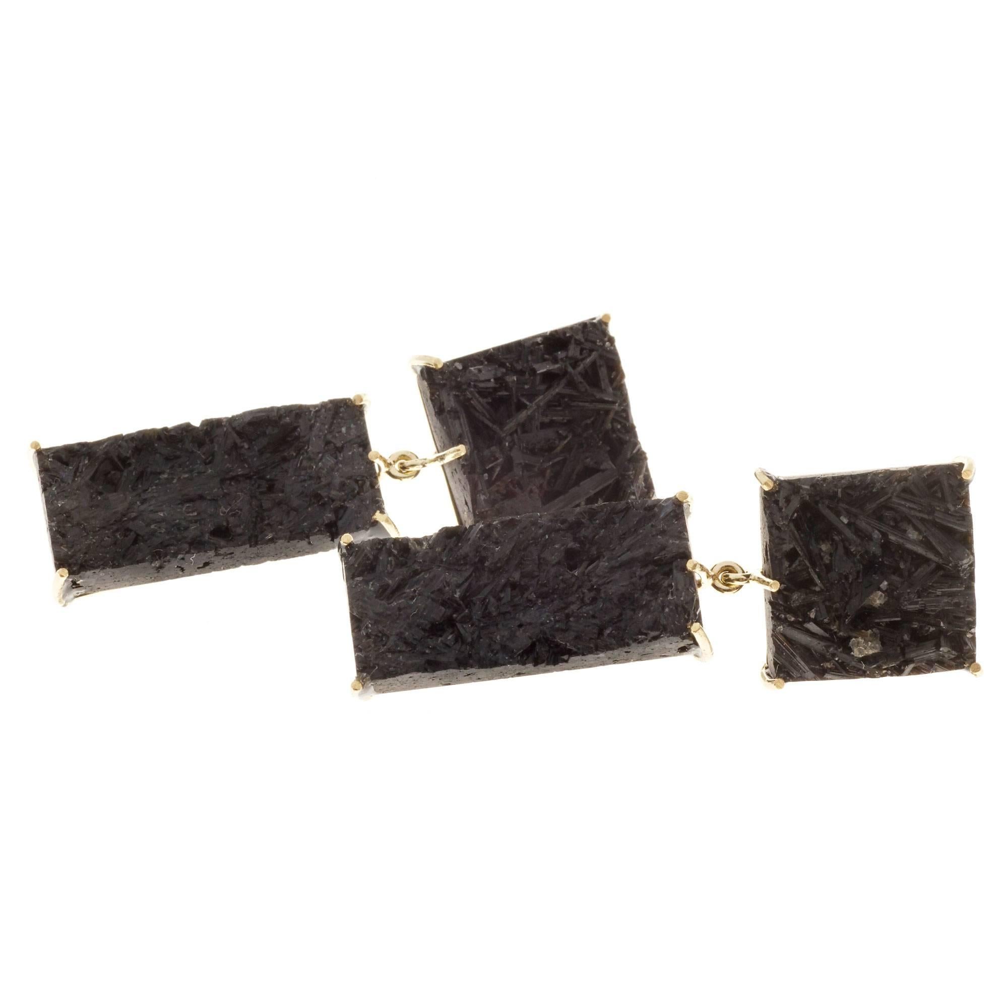 Black Tourmaline dangle earrings. Natural untreated crystal slices cut in square and rectangle shapes from the Peter Suchy Workshop. Handmade yellow gold frames.

2 square black Tourmaline, approx. total weight 16.47cts
2 rectangle black Tourmaline,