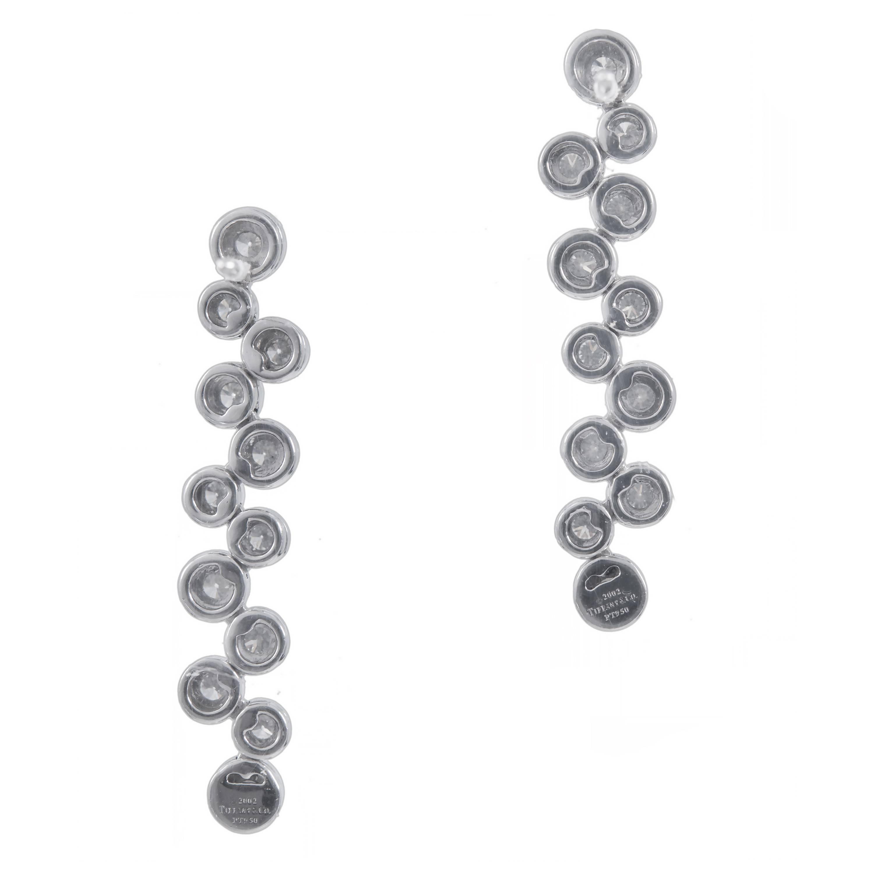 Tiffany & Co dangle flexible Diamond earrings from the “Bubbles” collection, with 2.00cts of fine ideal brilliant cut diamonds. Circa 2002. With Tiffany box.

24 round Ideal cut diamonds, 2.00cts total, F,VVS1 to VS1
Platinum
Tested: