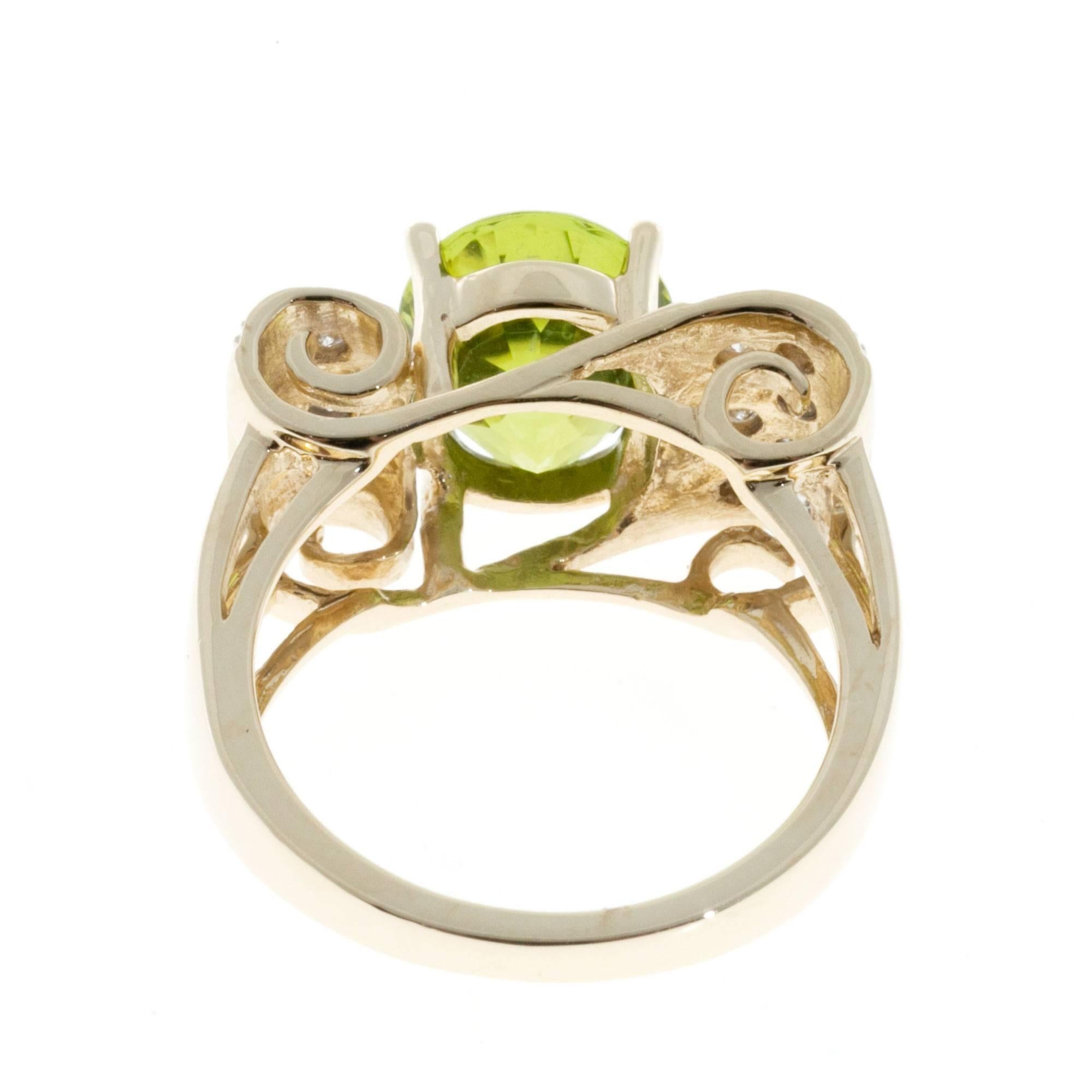 Oval Peridot Diamond Swirl Gold Ring For Sale 1