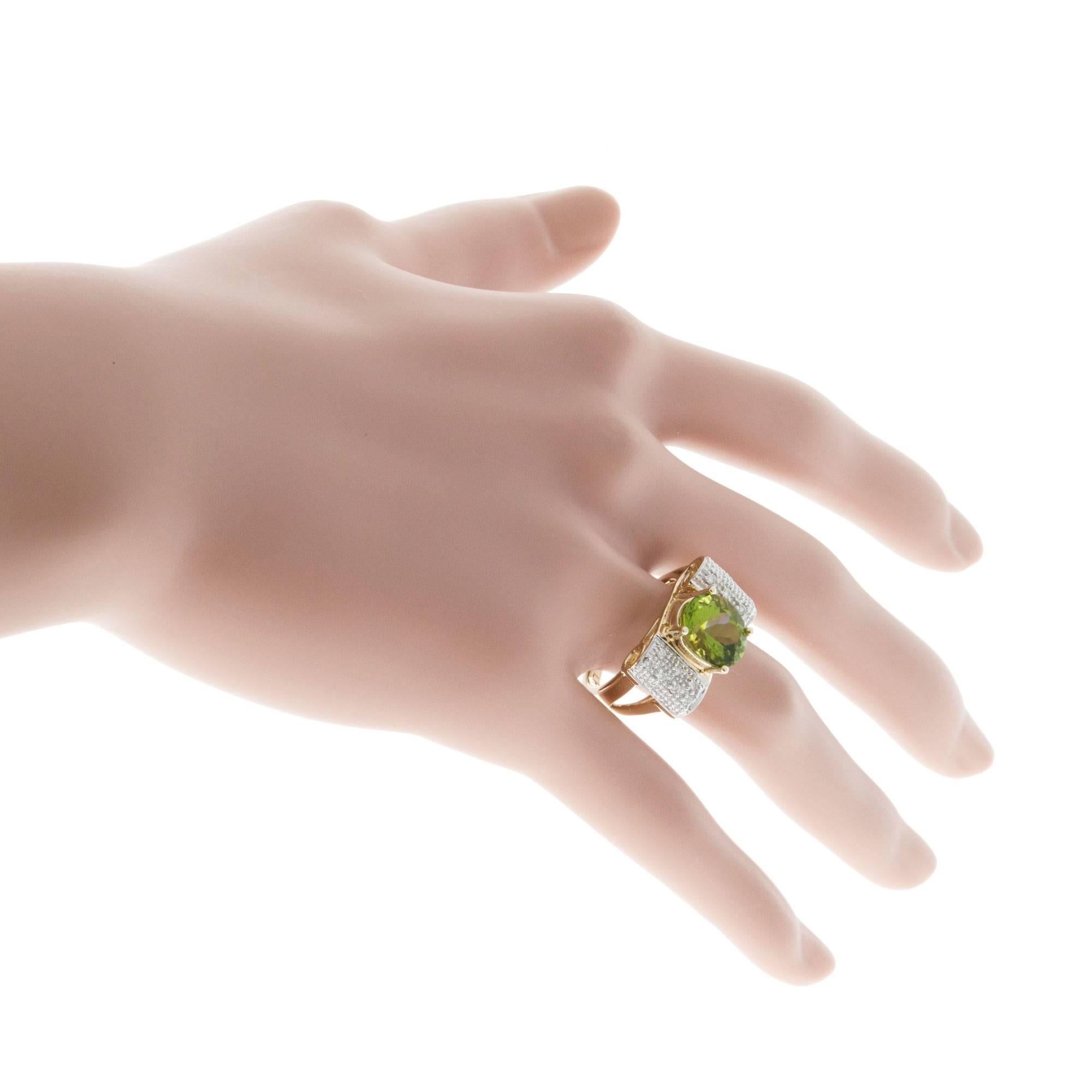 Oval Peridot Diamond Swirl Gold Ring For Sale 2