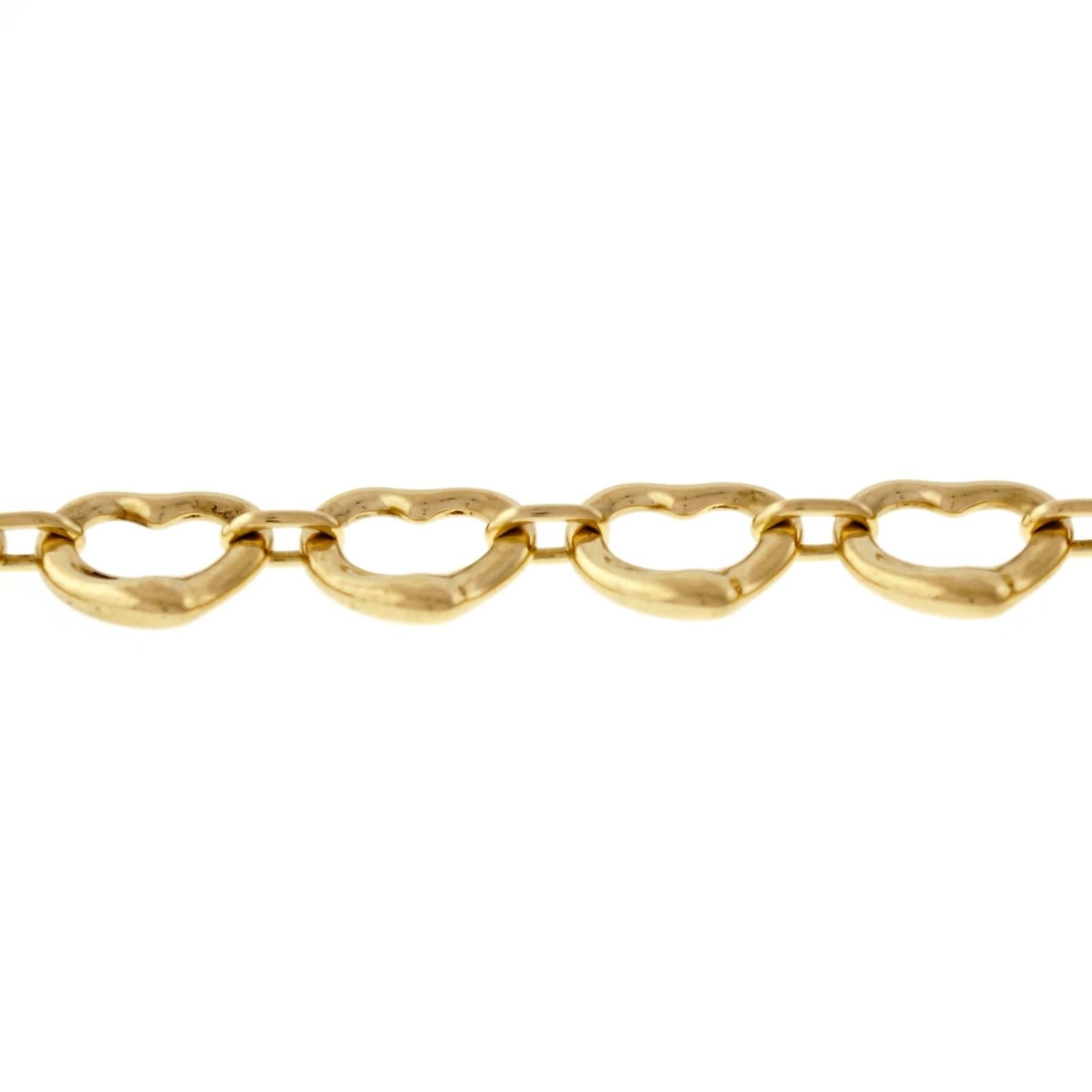 Tiffany & Co open heart 18k yellow gold toggle bracelet. Stamped on the second heart from the toggle.

18k yellow gold
Tested: 18k
19.1 grams
Stamped: 750
Hallmark: Tiffany & Co
Length: 7.75 inches – Width: 9.51mm – Depth: 3.37mm
