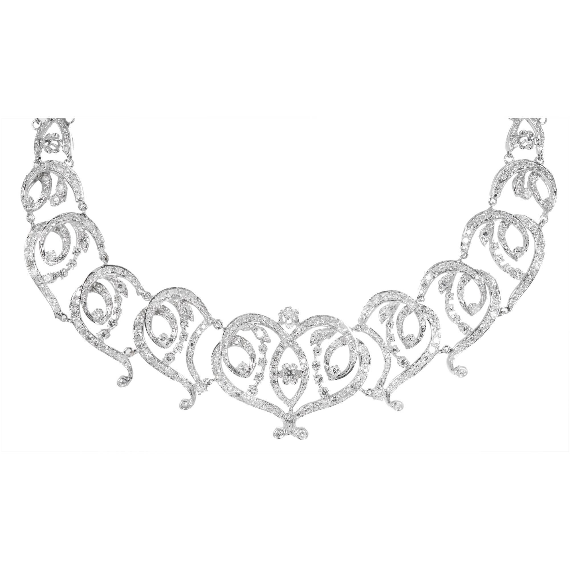 1950's swirl link white gold diamond necklace set with 11.00cts of mixed full and single cut diamonds. Diamond sections go all around the neck. 16.5 inches. 

600 round diamonds, approx. total weight 11.00cts, H – I, VS – SI
Length: 16.5 inches
14k