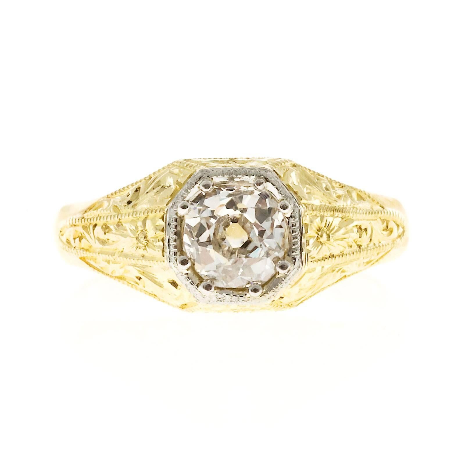 1880’s handmade ring in 18k yellow gold with a white gold 8 sided top. The original old mine brilliant cut diamond has fantastic sparkle with a raised crown and small table. crt

1 old mine brilliant cut diamond, approx. total weight .81cts, H –