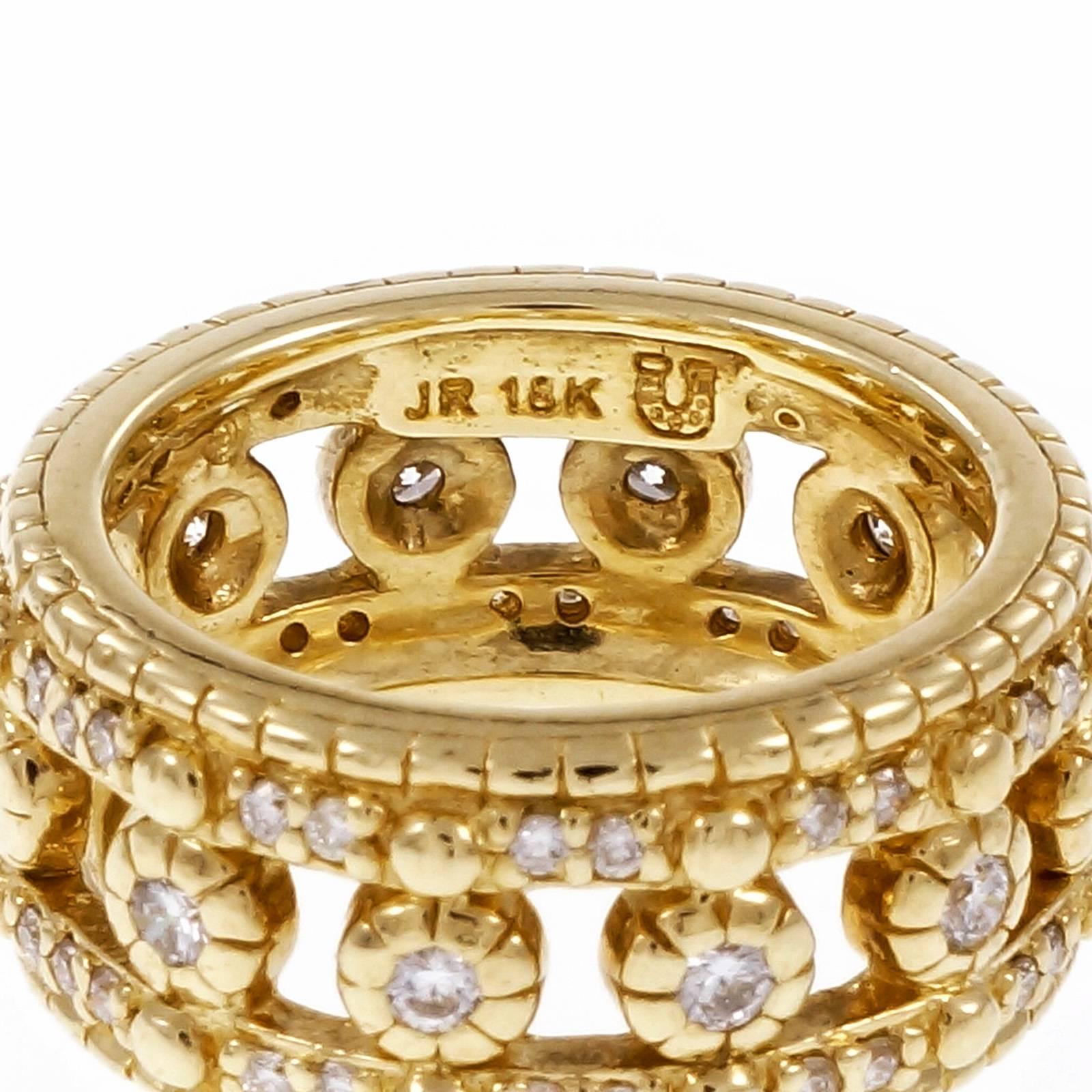 Judith Ripka wide 18k yellow gold diamond Eternity Wedding ring.Size 4 1/2

62 round diamonds, approx. total weight .62cts, H, VS – SI
18k yellow gold
Tested and stamped: 18k
Hallmark: JR
9.3 grams
Width at top: 8.70mm
Height at top: 2.81mm
Width at