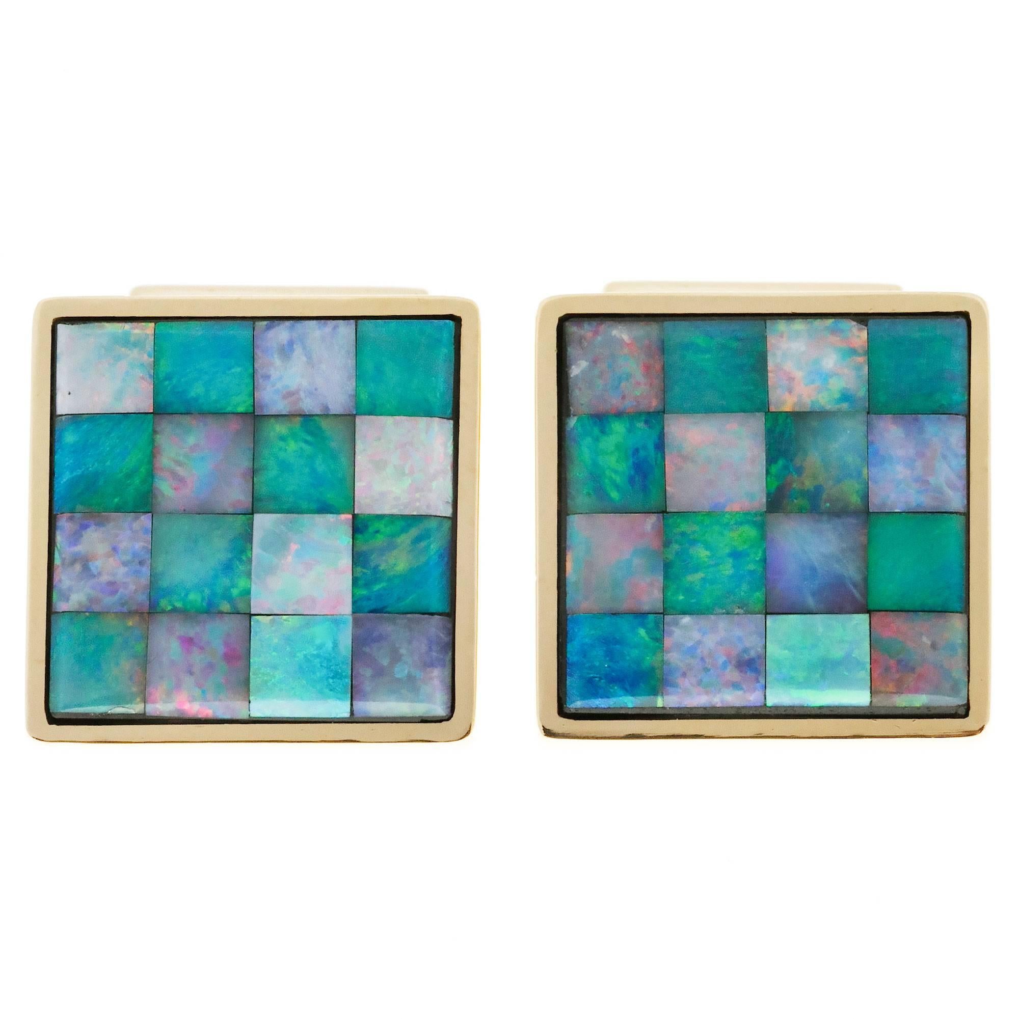 Opal Masonic 18k yellow gold square cuff links circa 1960-1969. Heavy clip backs and well made.

32 Masonic Opal  inlay, 3.80mm
Tested and stamped: 18k
18k yellow gold
Hallmark: Italy
Top to bottom: 17.84mm or .70 inch
Width: 17.99mm or .71