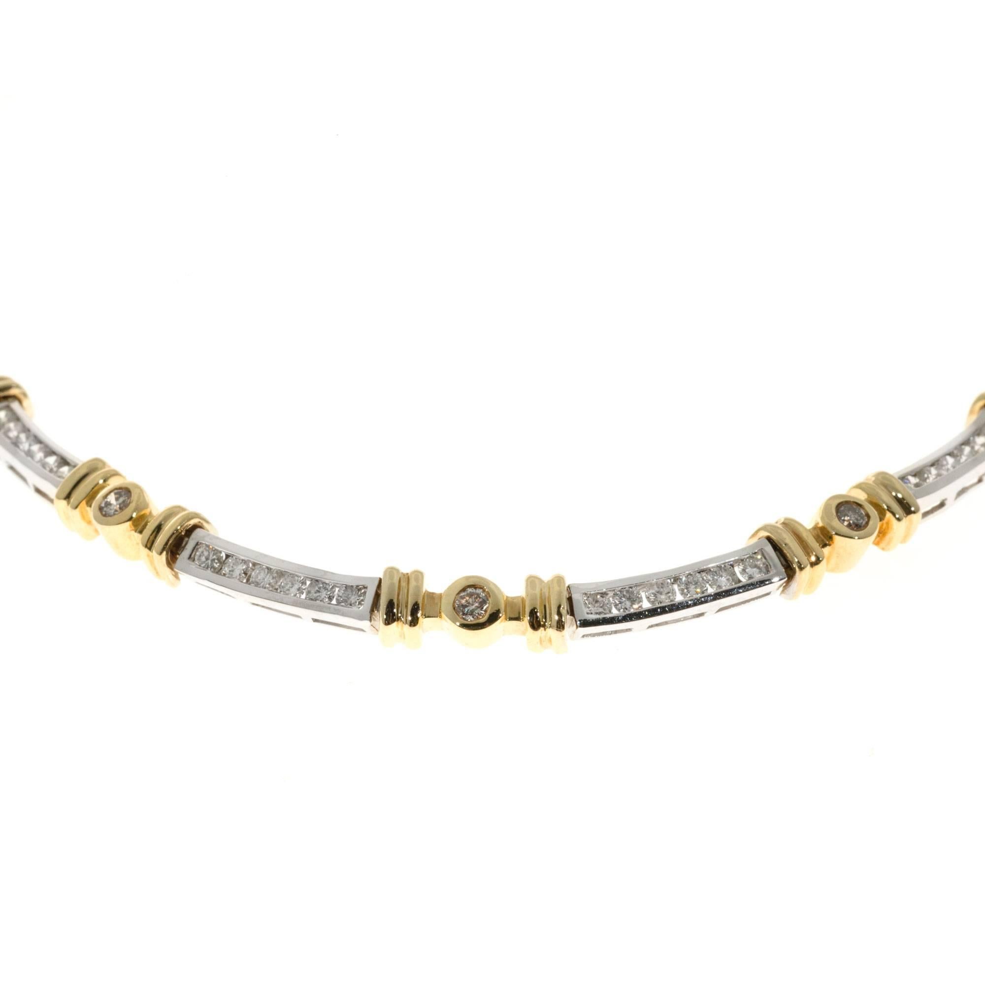 Simple and beautiful 2 tone Italian made necklace complete with a built in catch and an underside safety. Diamonds alternating channel set in white gold strips and bezel set in yellow gold tubes.

115 round diamonds approx. total weight 5.02cts,