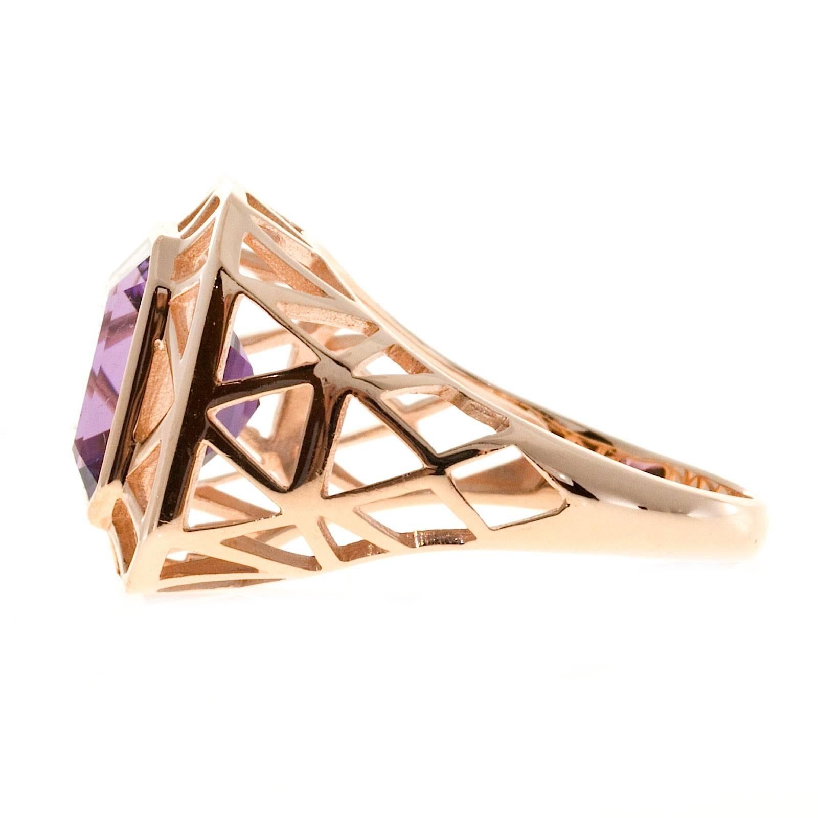 Medium purple Amethyst ring.

1 medium purple Amethyst, approx. total weight 4.20cts, VS
14k Rose gold
Tested and stamped: 14k
4.9 grams
Width at top: 15.4mm
Height at top: 7mm
Width at bottom: 2.3mm
Size 8 and sizable
