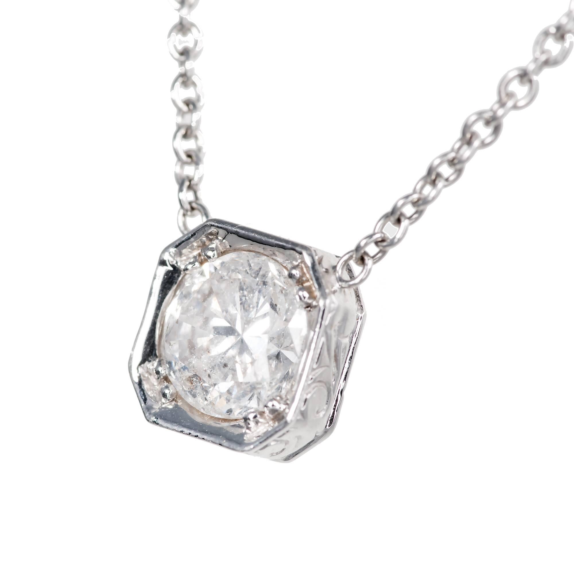 Peter Suchy transitional cut diamond 1.39ct white, bright and sparkly. Custom designed style pendant with bead setting and engraved sides on a simple chain.

1 round diamond, approx. total weight 1.39cts, H, I1, 7.05 x 6.93 x 4.36mm, mostly eye