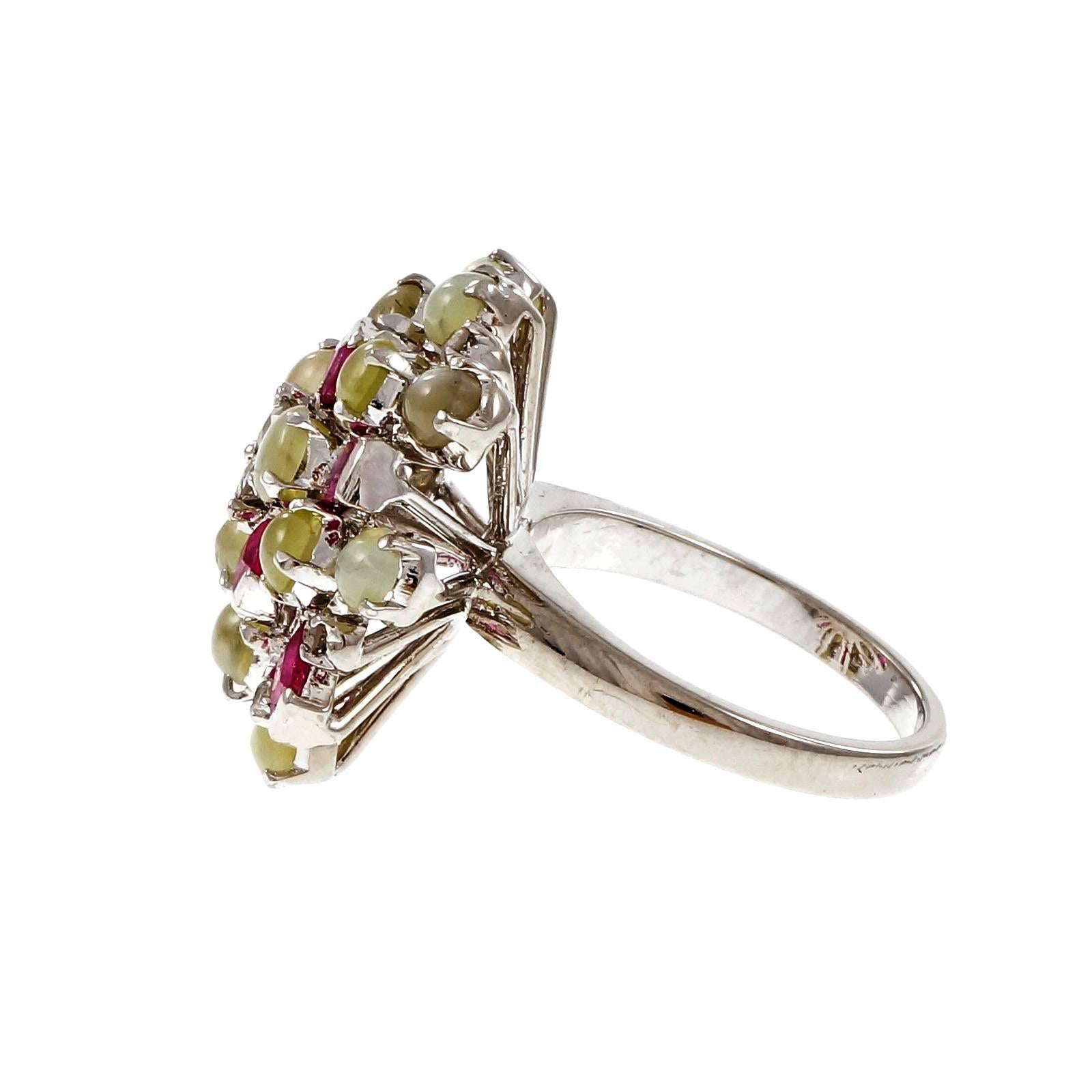 1950’s Diamond Spinel Chrysoberyl Cats Eye Gold Cluster Ring. GIA certified. 

9 round diamonds, approx. total weight .36cts, H, SI
8 square red Spinel, approx. total weight 1.25cts, VS – SI, no heat, 2.65 x 2.76mm, GIA certificate