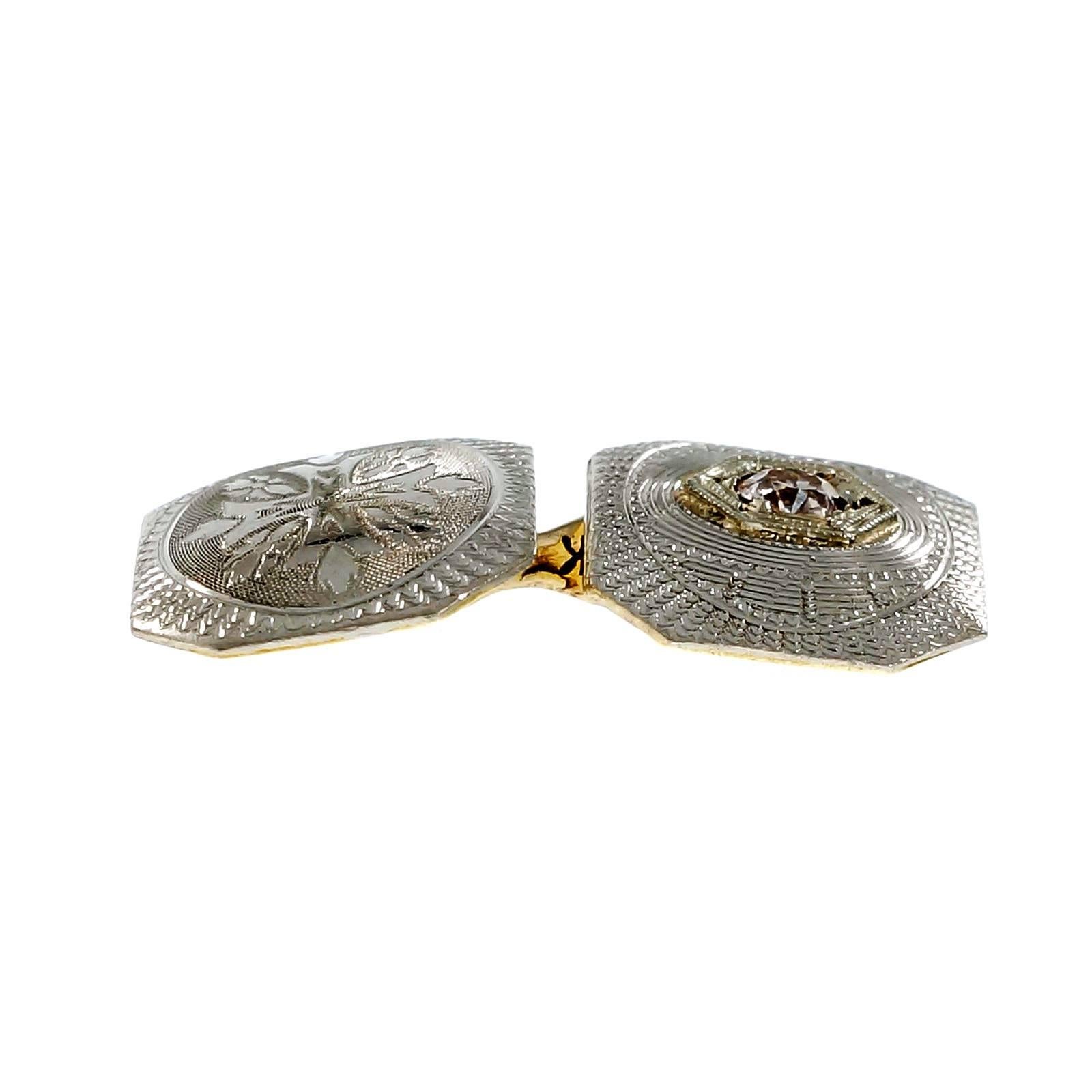 Engraved 1930s Platinum top over 14k gold double sided diamond cufflinks. 

2 round European cut diamonds, approx. total weight .20cts, H, SI1
14k yellow gold and Platinum
Tested: 14k & Platinum
Stamped: Plat top 14k back
5.8 grams
Top to bottom: