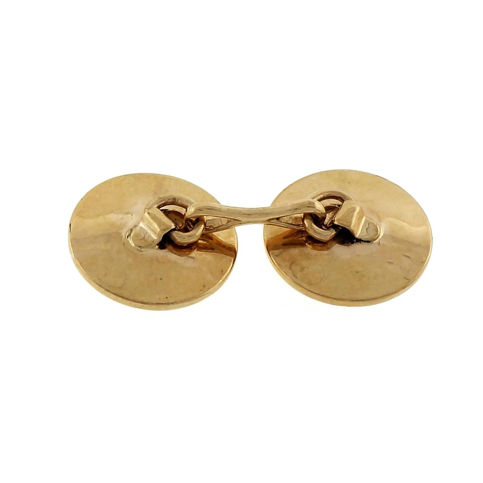 Double sided 1950 button style hand textured 14k yellow gold cufflinks.

14k yellow gold
Tested and stamped: 14k
9.6 grams
Top to bottom: 14.31mm or .57 inch
Width: 14.31mm or .57 inch
Depth: 3.04mm
