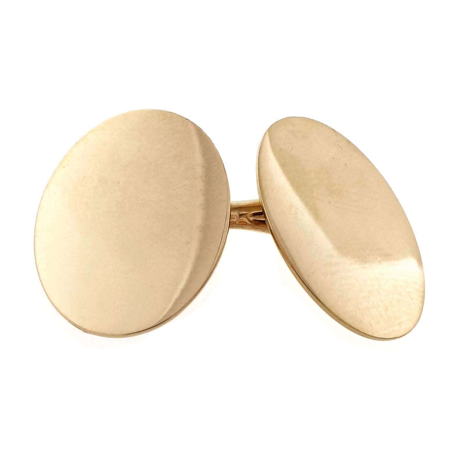 Tiffany & Co double sided cuff links made by Larter & Sons for Tiffany & Co. Circa 1960.

14k yellow gold
Tested and stamped: 14k
Hallmark: Tiffany & Co
8.9 grams
Top to bottom: 13.81mm or .54 inch
Width: 18.79mm or .74 inch
Depth: .62mm

