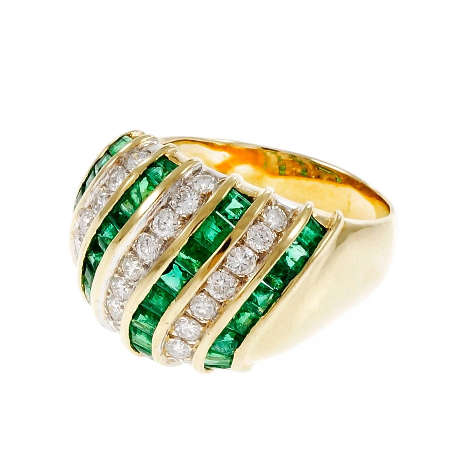 1960-1969 18k yellow gold cocktail dome ring with gem square bright green natural Emeralds and bright white round full cut diamonds.

25 round diamonds, approx. total weight 1.00cts, G, VS – SI
32 square bright green emeralds, approx. total