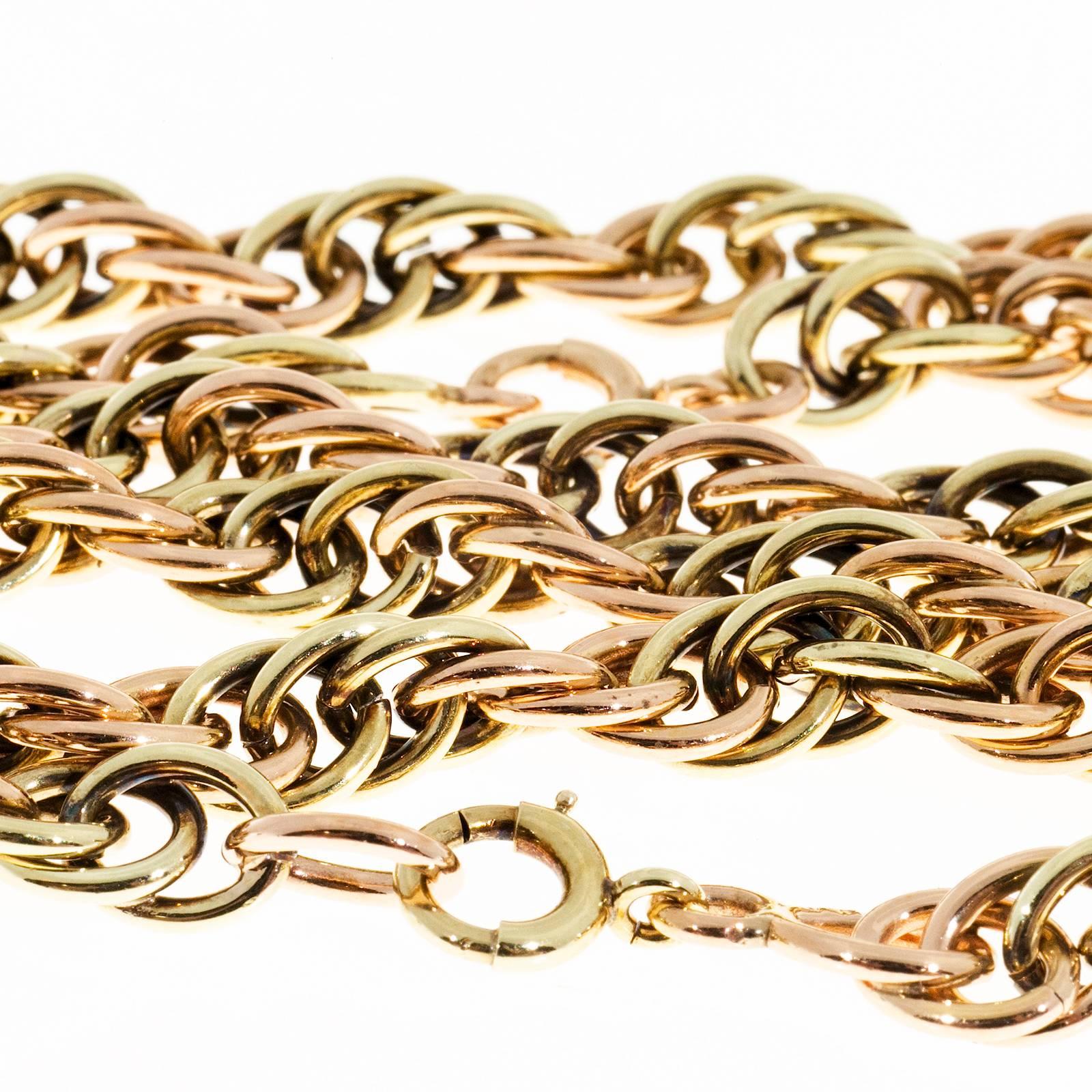 Retro 1940's Rose and green gold necklace and bracelet set. Solid gold heavy wire links. Original spring ring catches. Bracelet and chain hook together to make a 24 inch necklace

14k Rose Gold
Tested: 14k rose
Stamped: 14k
8.2mm wide
Chain: