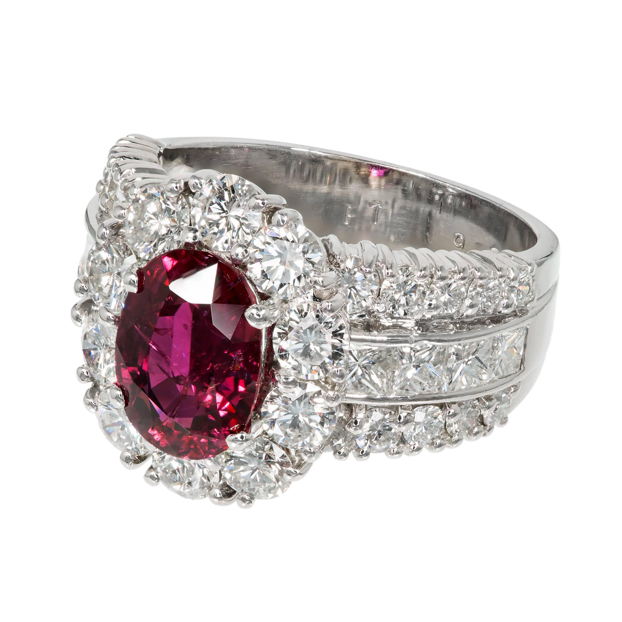 Authentic Hammerman Brothers 1960-1969 Platinum engagement ring with high quality diamonds and a fine top gem bright red clear Ruby AGL certified as natural color. Low to moderate clarity enhancements.

1 oval red Ruby, approx. total weight 2.98cts,