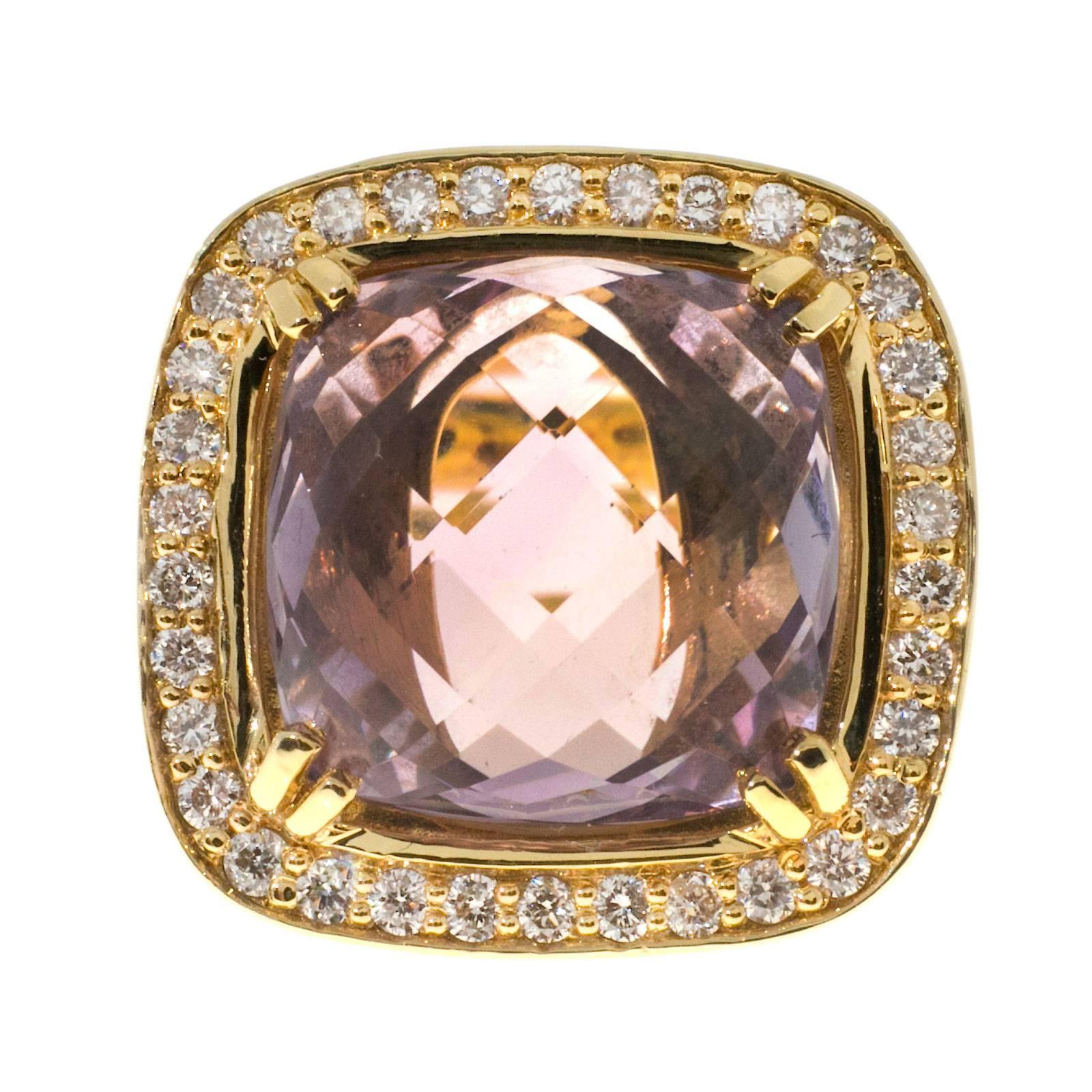 1980s 14k rose gold ring with smoky faceted top Quartz surrounded by a halo of full cut white diamonds.

One 12 x 12mm cushion smoke brown pink smoky Quartz, approx. total weight 7.00cts, VS, natural color
34 full cut diamonds, approx. total