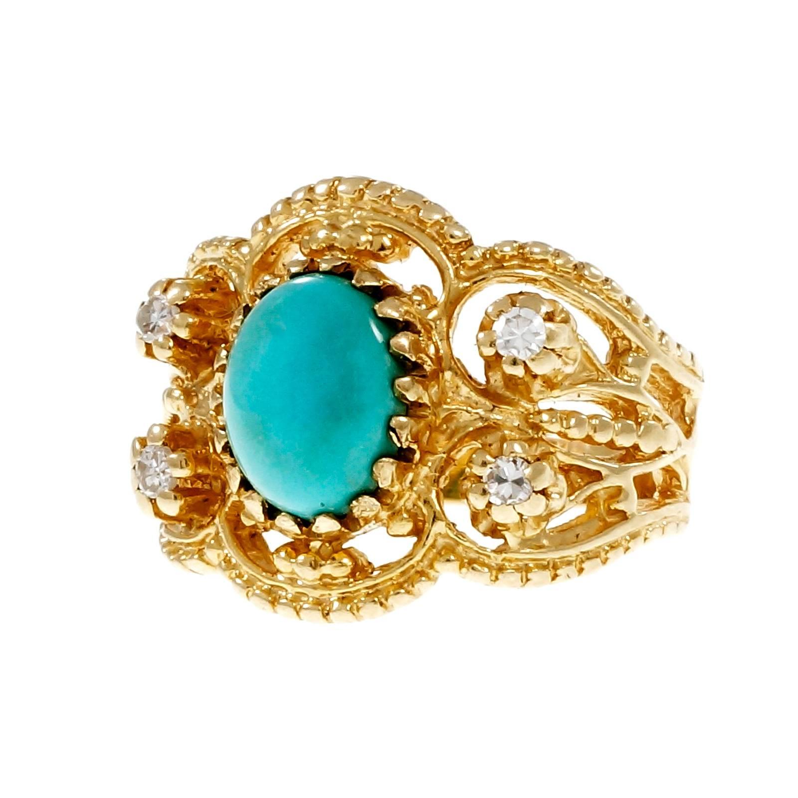 Natural Persian Turquoise 1940-1949 Byzantine style ring with single cut diamonds. Bright blue Turquoise.

1 oval blue Persian Turquoise, 8.66 x 6.62 x 3.77mm
4 round single cut diamonds, approx. total weight .16cts, H – I, SI
14k yellow