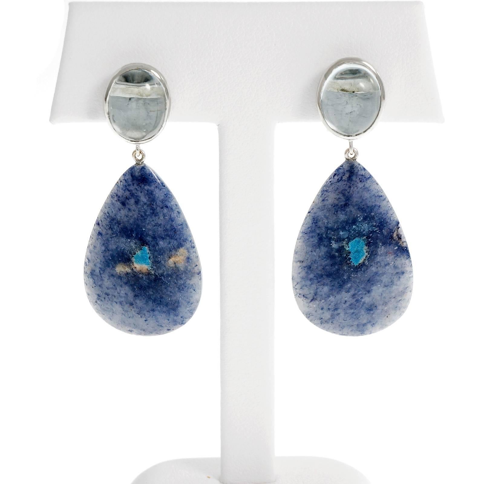 Peter Suchy dangle earrings with cabochon oval Aqua tops and Quartz pear shape dangle with Lazulite and Trolleite. 18k white gold

2 oval cabochon blue Aquamarine, approx. total weight 8.75cts
2 pear shaped grey blue Quartz Lazulite Trolleite,