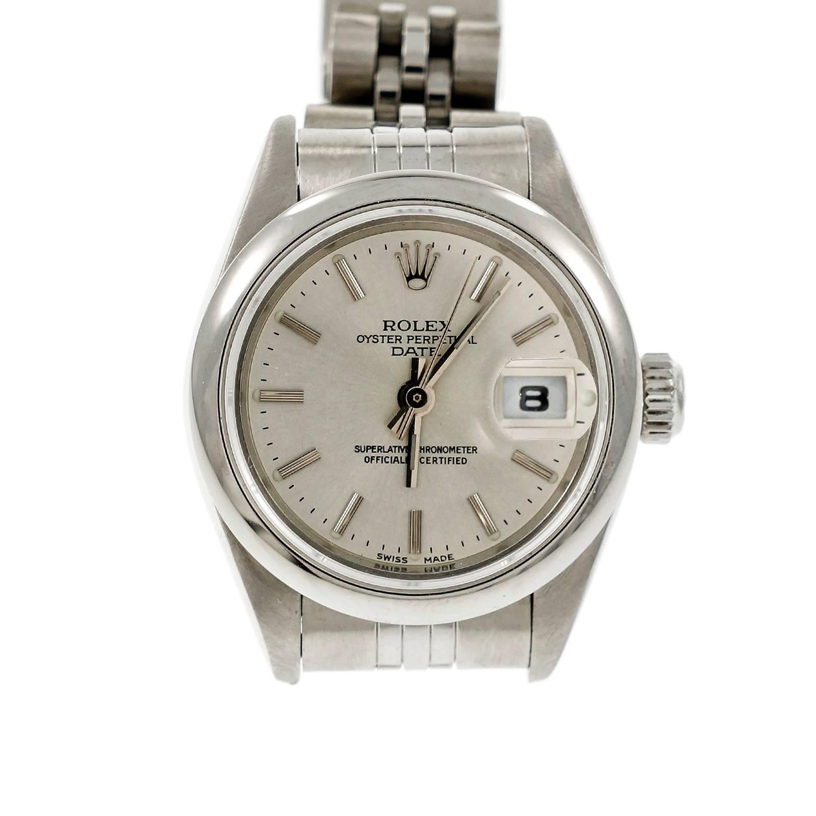 Ladies Rolex Oyster Perpetual Date plain bezel original Rolex dial. After market band with original Rolex end pieces and buckle. Model 79240. Circa 1999.

Stainless steel
54.7 grams
Band length: 7.75 inches – can be shortened or links