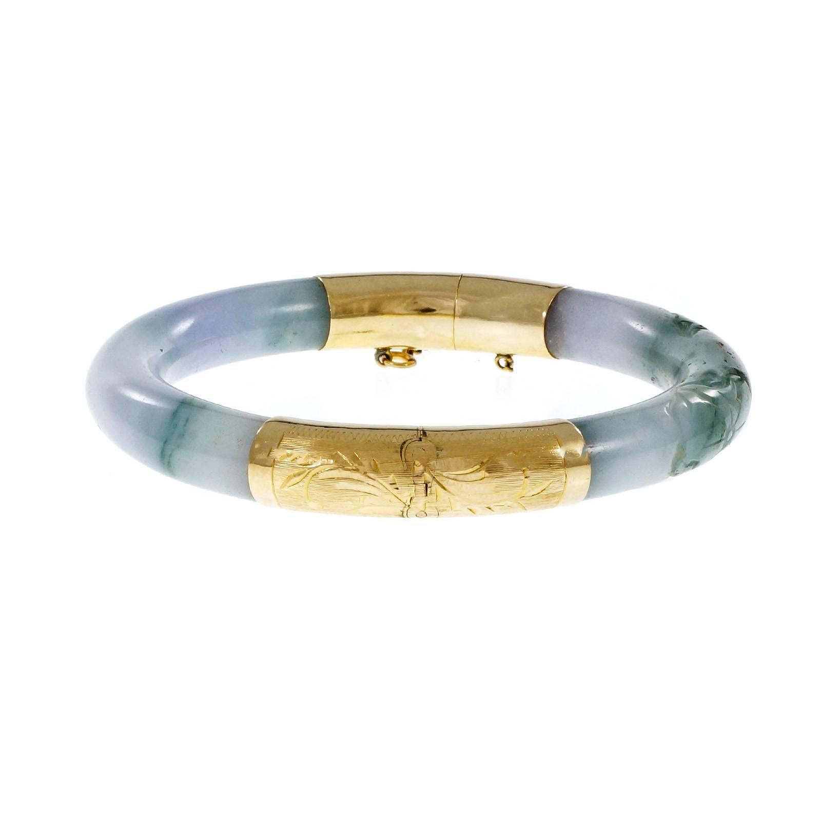 GIA certified natural Jadeite Jade hinged bangle bracelet with hand engraved hinge caps. Natural variegated purple and green Jadeite Jade. 

2 arc shaped natural purple and green Jadeite Jade, natural color and no enhancements, GIA certificate