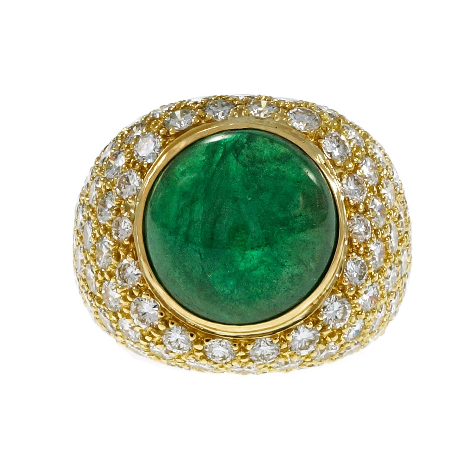 1960's Round green emerald and diamond cocktail ring. GIA certified cabochon domed center natural beryl emerald with moderate clarity enhancement. 127 full cut Pave set diamonds, in a 18k yellow gold setting.  

1 round cabochon Emerald, approx.