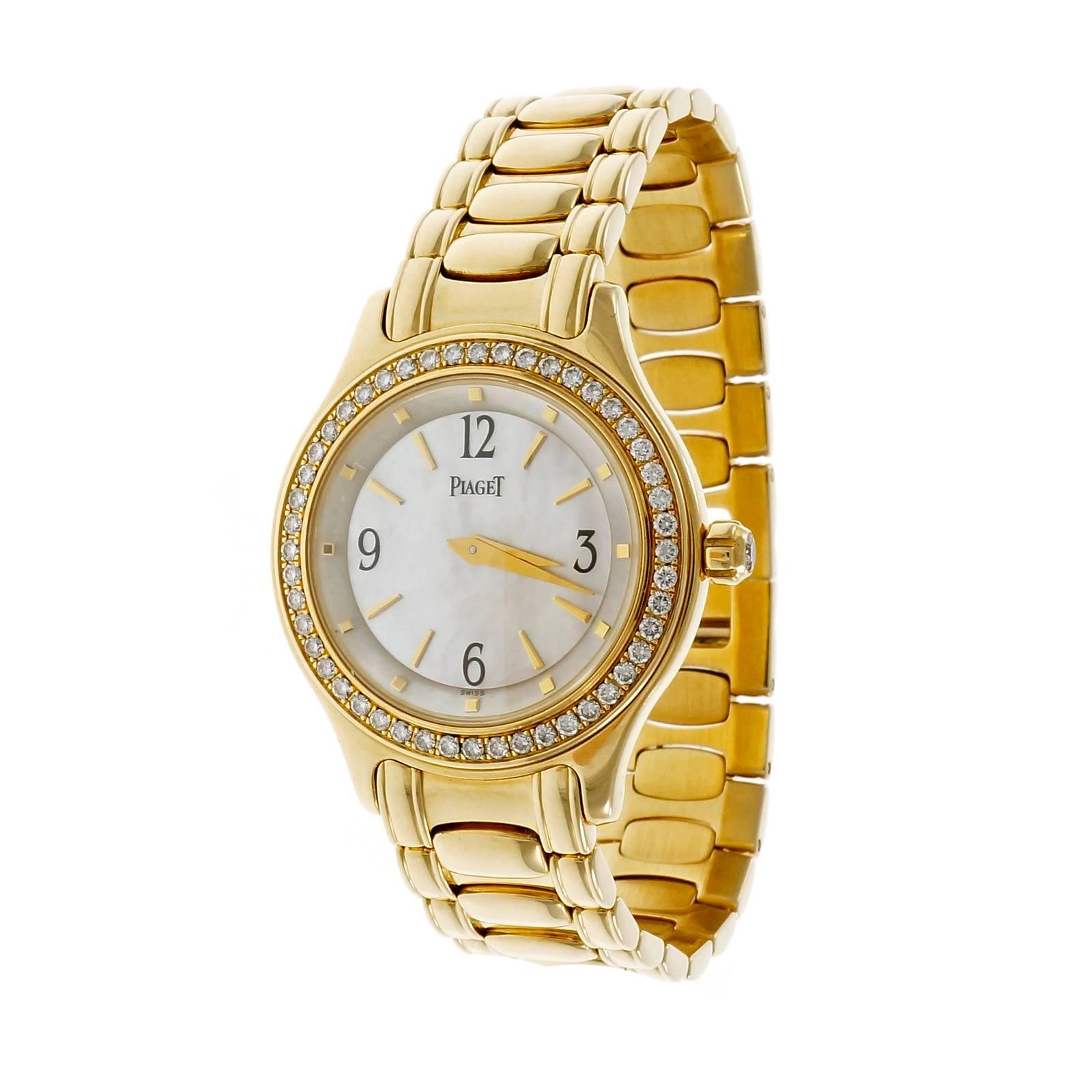 Piaget solid 18k yellow gold wristwatch diamond crown, dial and diamond bezel. All factory original. Circa 2000. Quartz movement.

18k yellow gold
Band length: 6.75 inches – can be shortened
82.8 grams
Length: 32.4mm
Width: 27.5mm
Band width